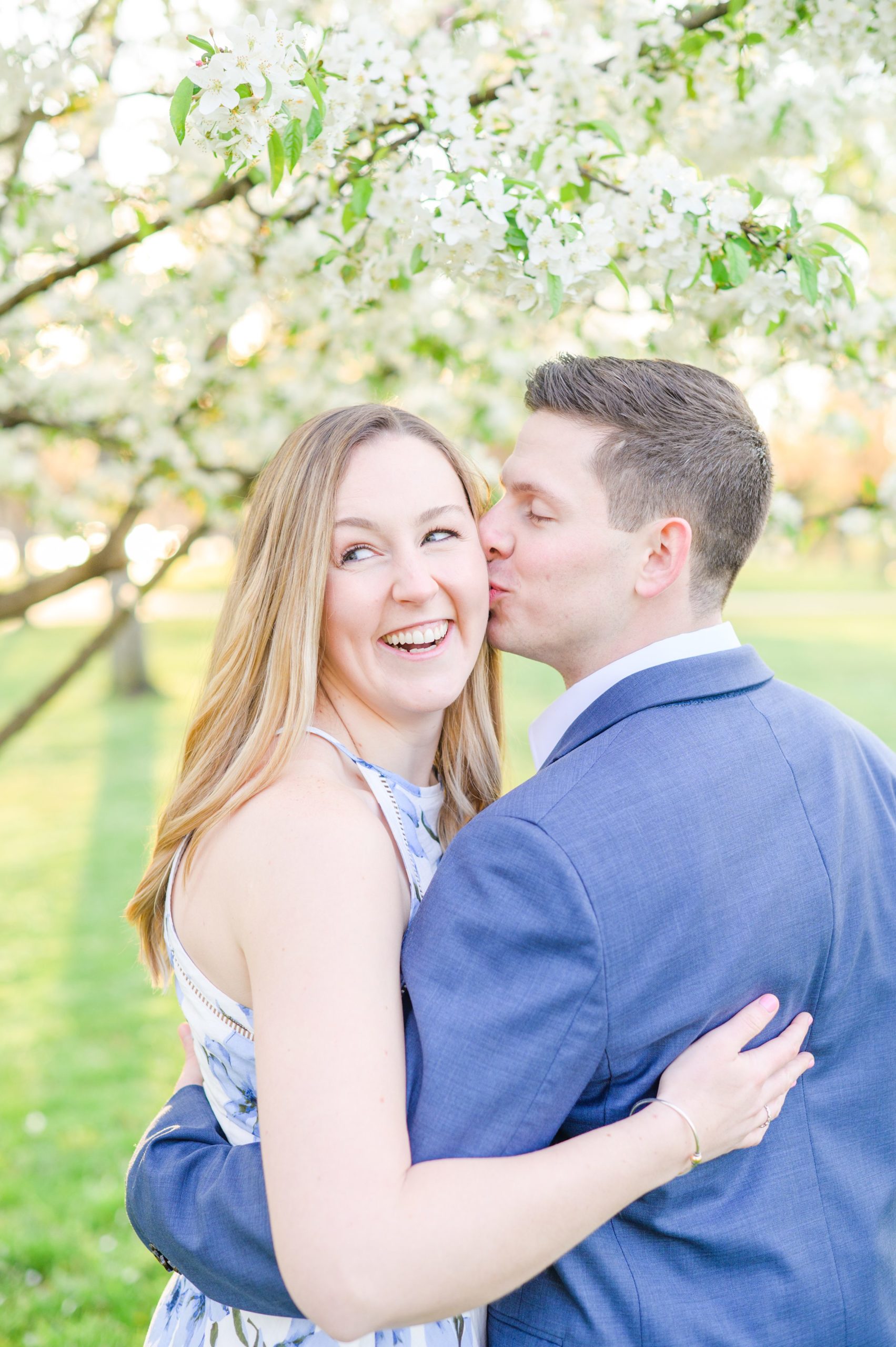 Beautiful engagement session with spring blossoms at Constitution Gardens in Washington, DC by Maryland Wedding Photographer Cait Kramer Photography