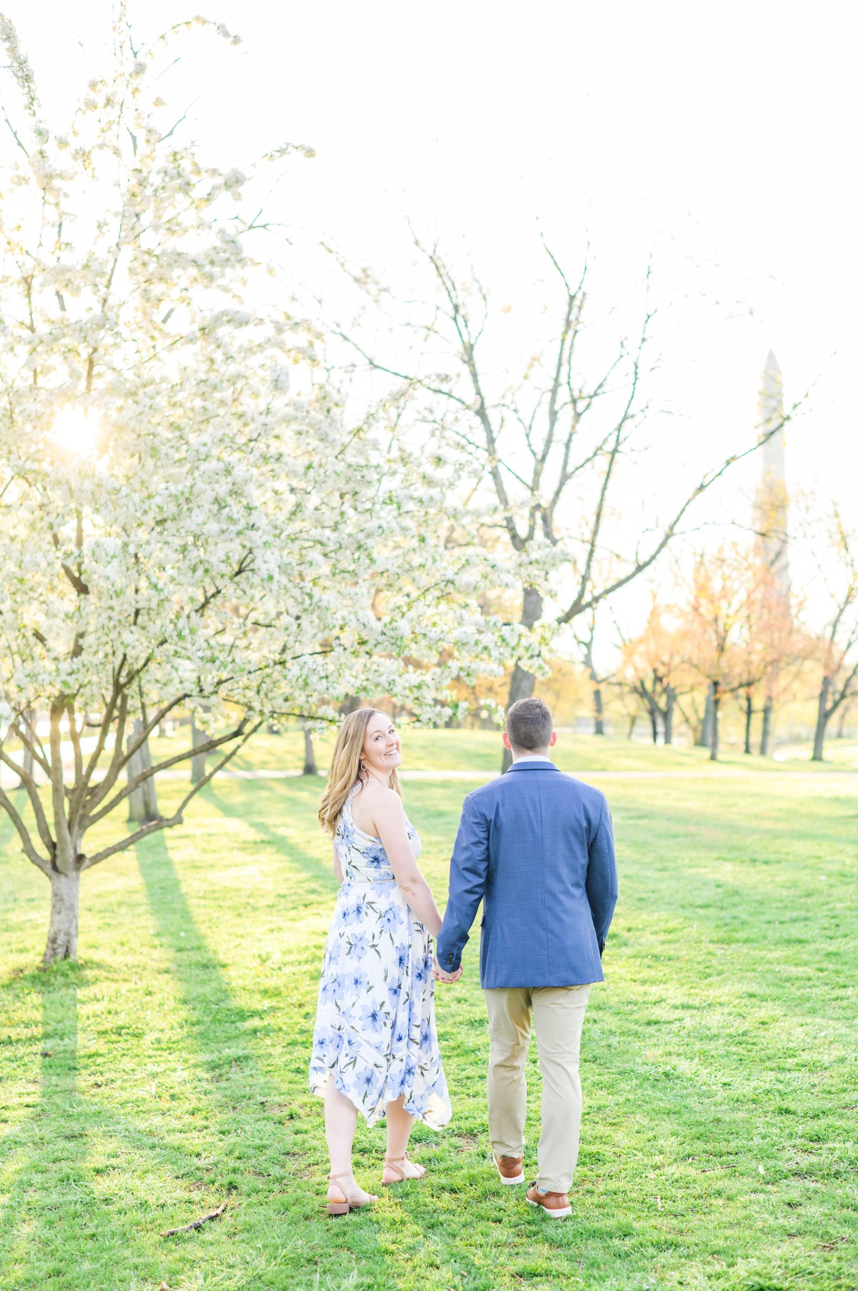 Beautiful engagement session with spring blossoms at Constitution Gardens in Washington, DC by Maryland Wedding Photographer Cait Kramer Photography