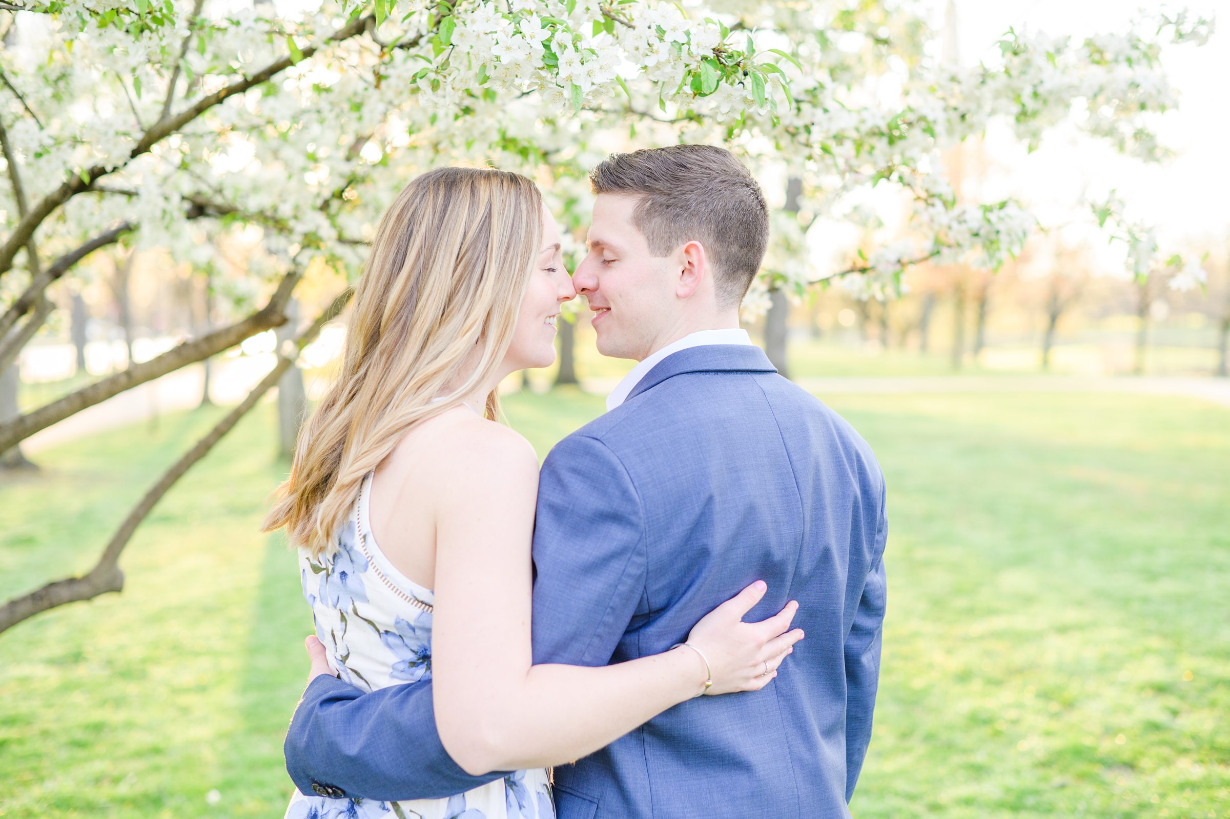 Beautiful engagement session with spring blossoms at Constitution Gardens in Washington, DC by Maryland Wedding Photographer Cait Kramer Photography