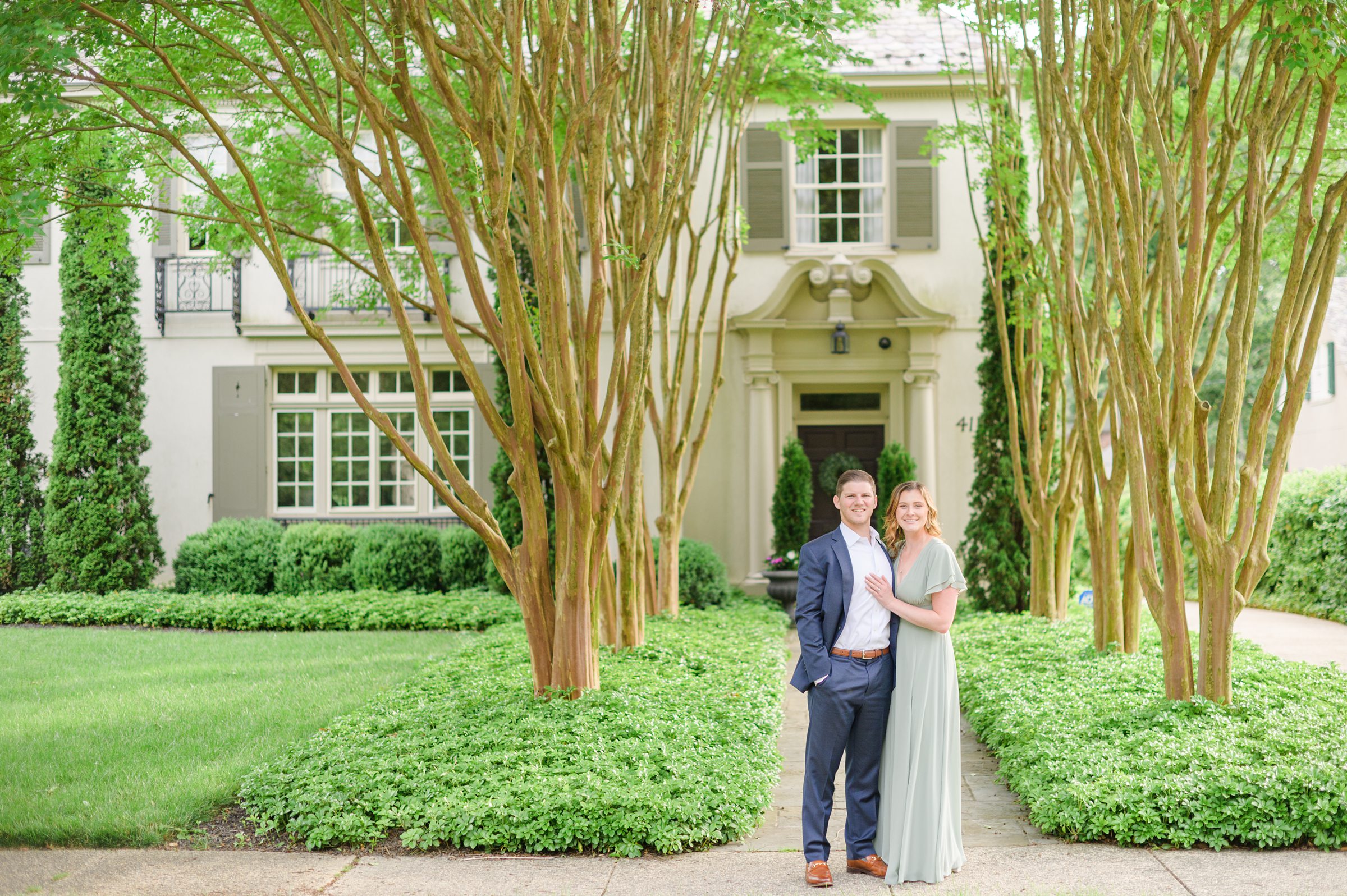 Engaged Couple smiles in Sherwood Gardens engagement session photographed by Maryland Wedding Photographer Cait Kramer Photography