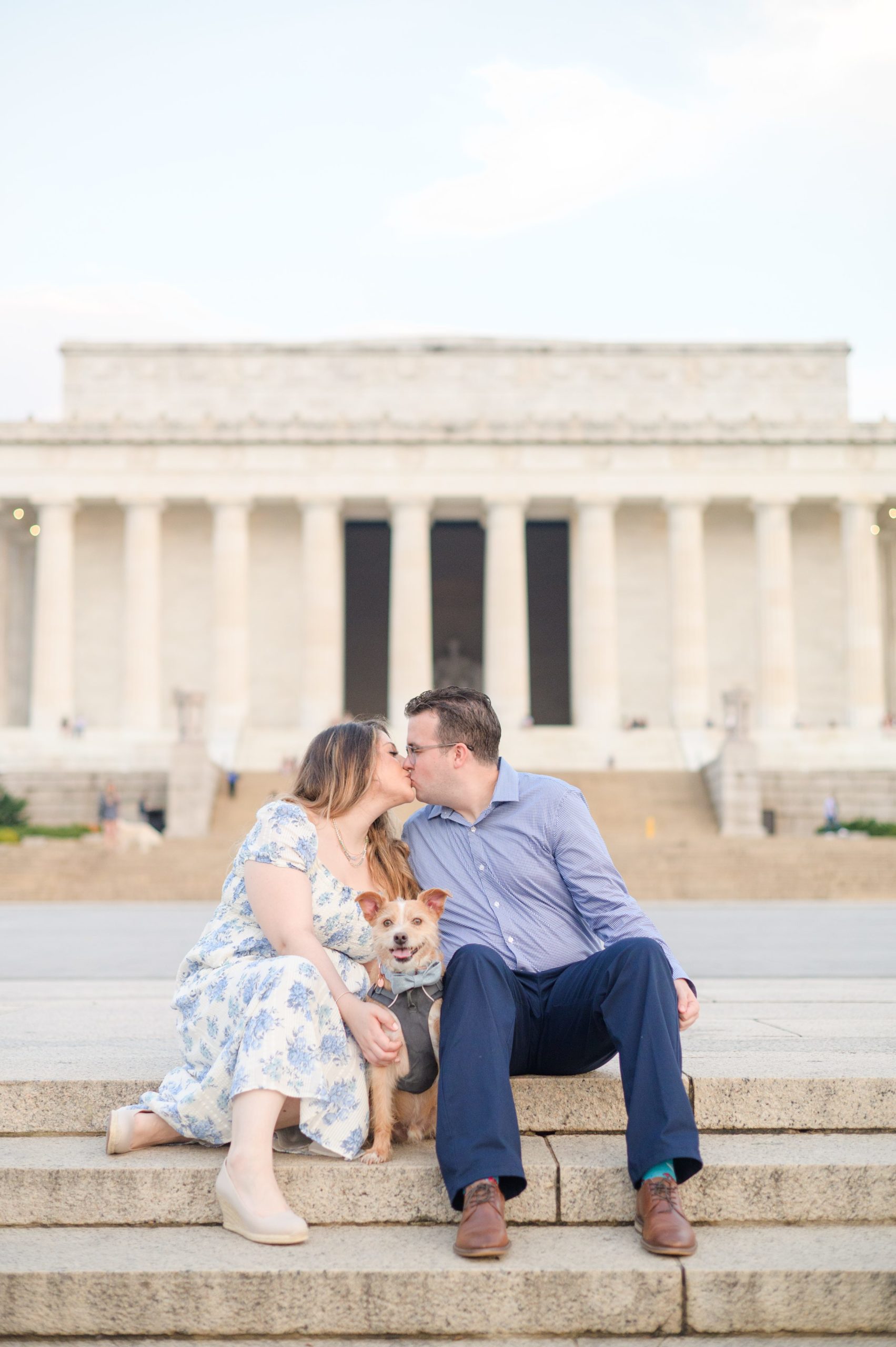 Couple smiles during their engagement photos at the Lincoln Memorial photographed by Baltimore Wedding Photographer, Cait Kramer Photography