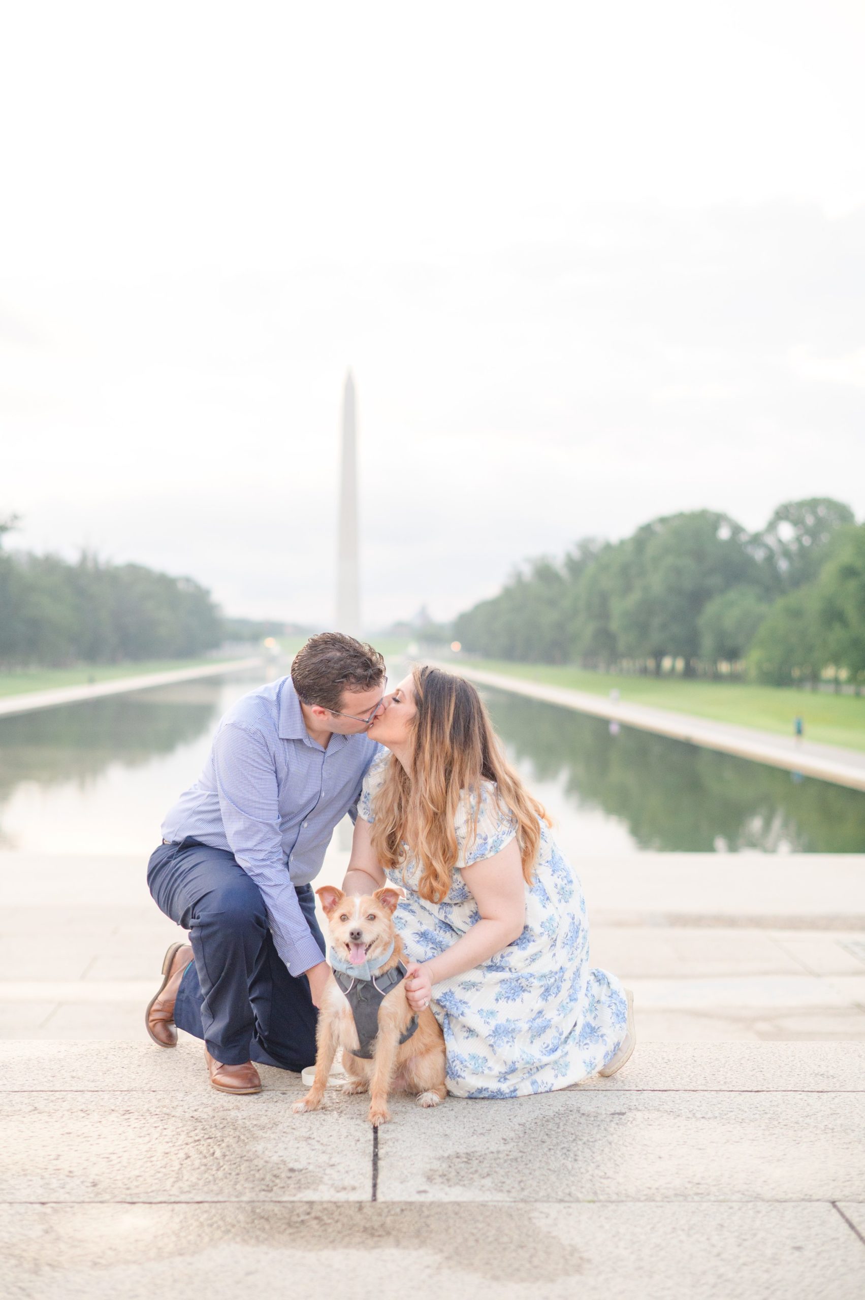 Couple smiles during their engagement photos at the Lincoln Memorial photographed by Baltimore Wedding Photographer, Cait Kramer Photography
