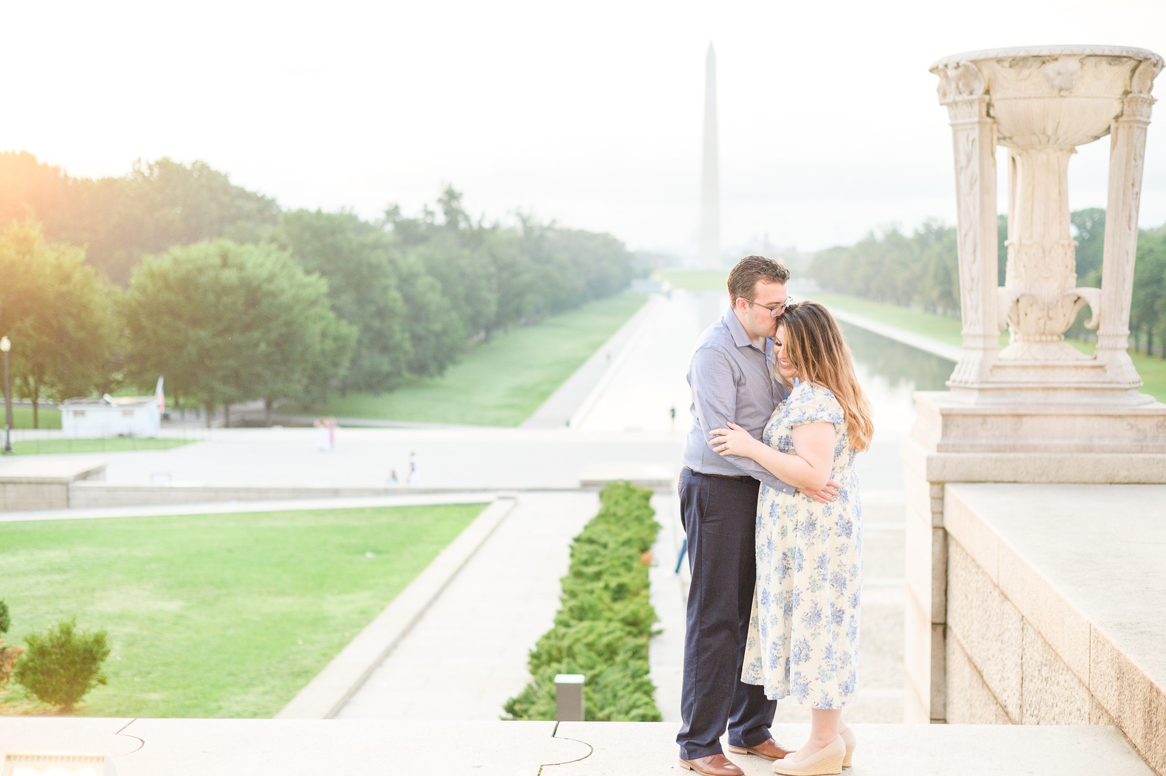 Couple smiles during their engagement photos at the Lincoln Memorial photographed by Baltimore Wedding Photographer, Cait Kramer Photography