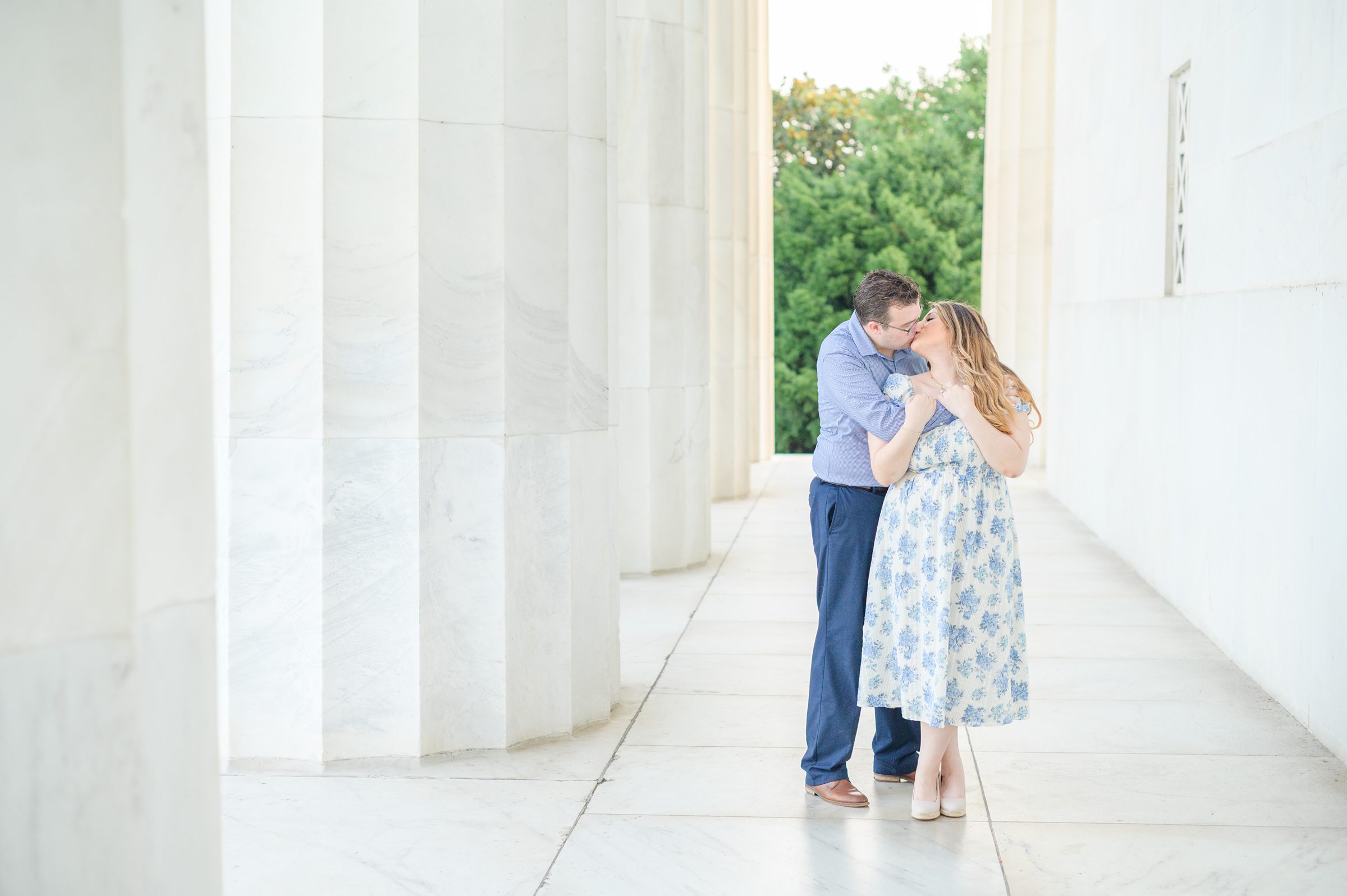 Couple smiles during their engagement photos at the Lincoln Memorial photographed by Baltimore Wedding Photographer, Cait Kramer Photography