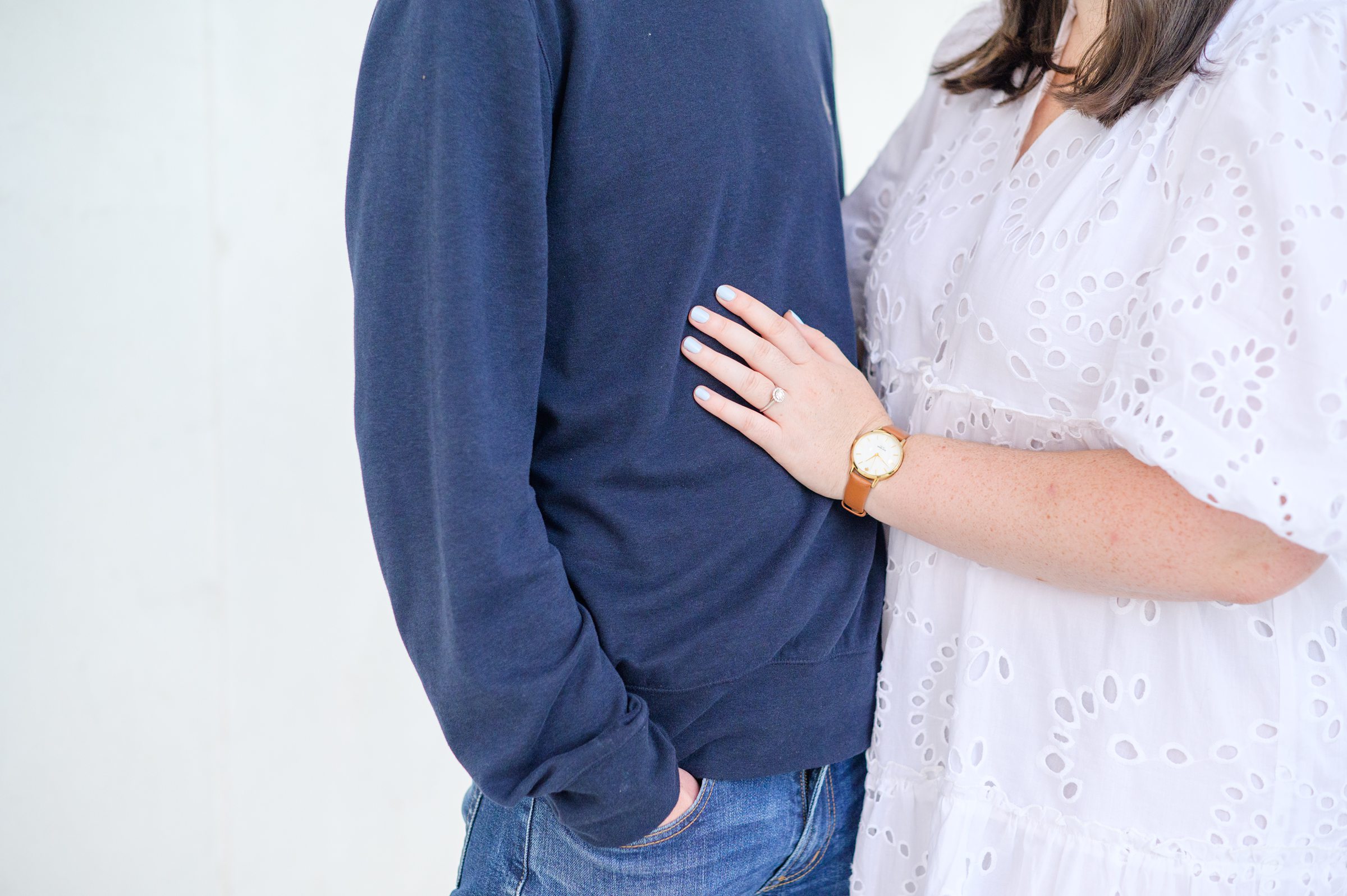 Couple smiles during their Lincoln Memorial engagement photos during session photographed by Baltimore wedding photographer, Cait Kramer