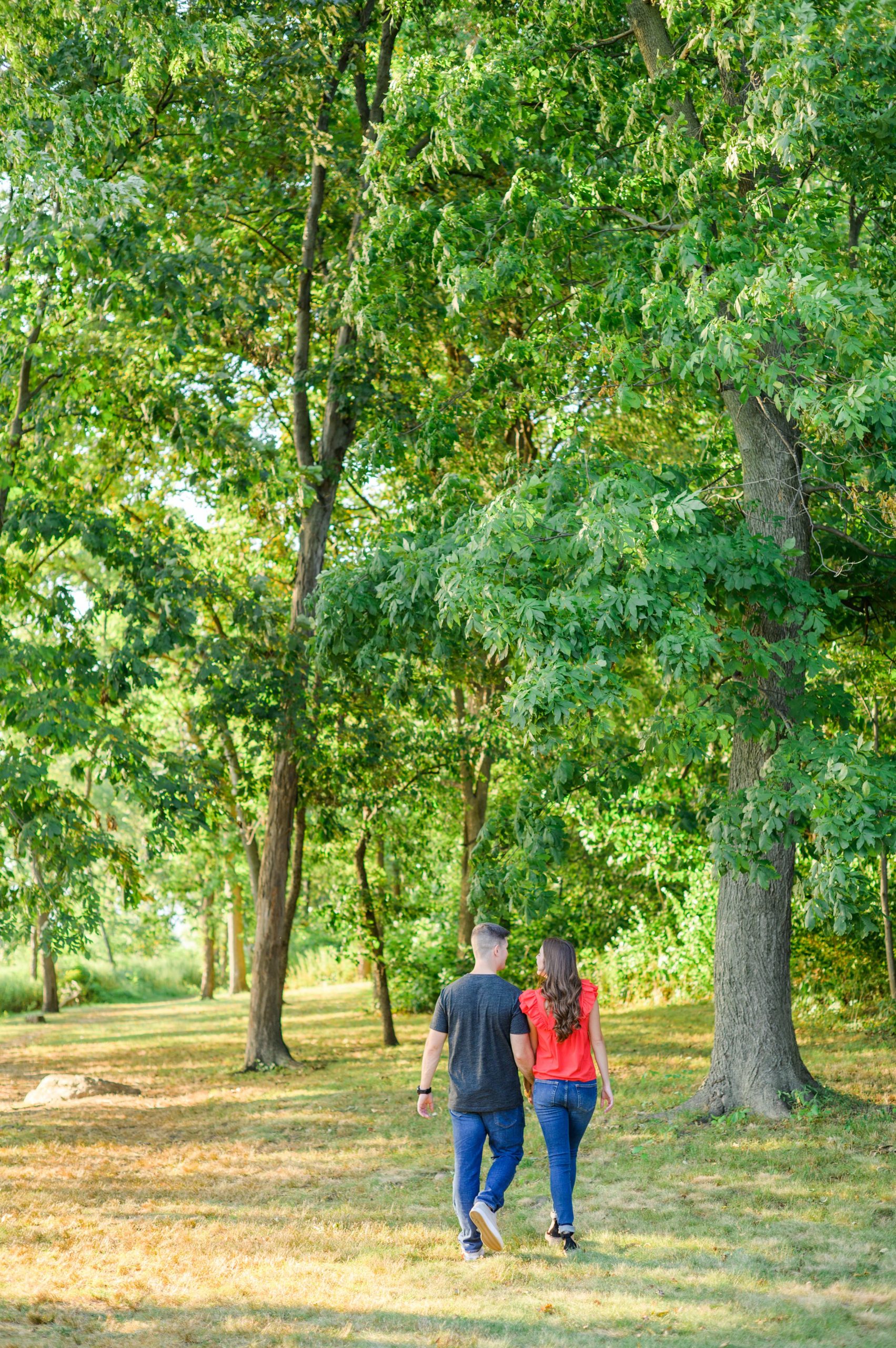 Engaged couple at a local park for their summer engagement session at Fort Hunter Mansion and Park in Harrisburg, Pennsylvania photographed by Baltimore Wedding Photographer Cait Kramer Photography