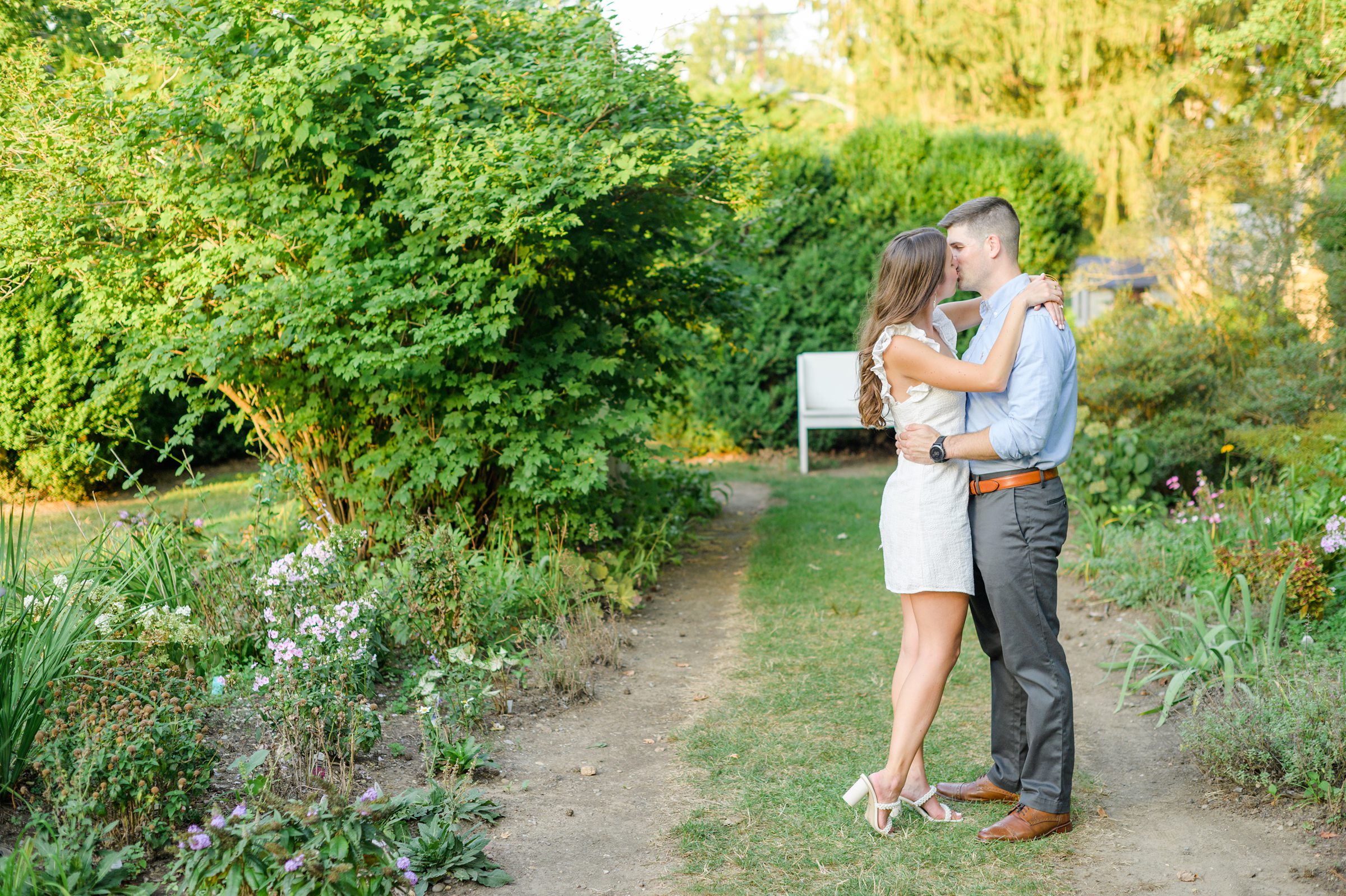 Engaged couple at a local park for their summer engagement session at Fort Hunter Mansion and Park in Harrisburg, Pennsylvania photographed by Baltimore Wedding Photographer Cait Kramer Photography