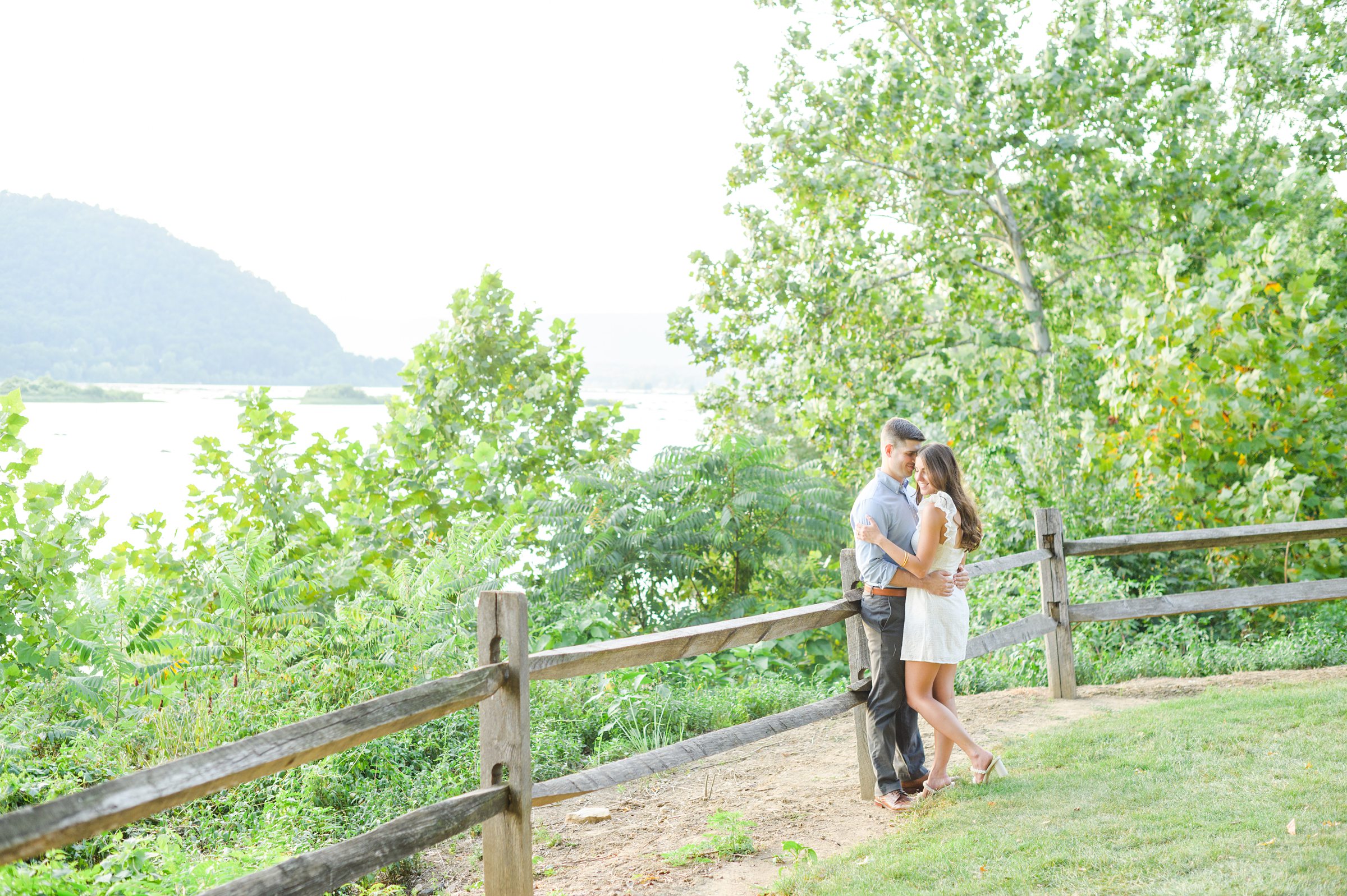 Engaged couple at a local park for their summer engagement session at Fort Hunter Mansion and Park in Harrisburg, Pennsylvania photographed by Baltimore Wedding Photographer Cait Kramer Photography