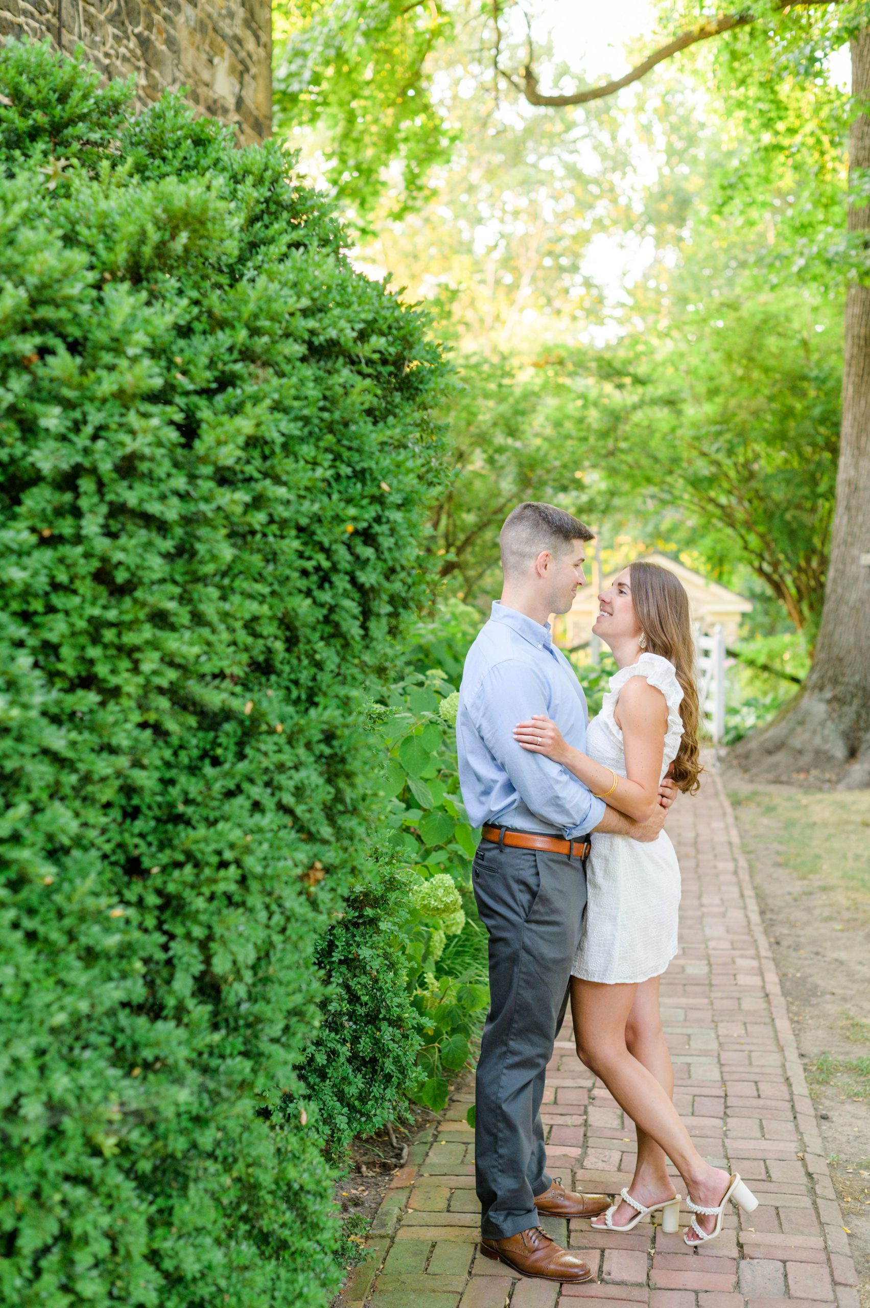 Engaged couple at a local park for their summer engagement session at Fort Hunter Mansion and Park in Harrisburg, Pennsylvania photographed by Baltimore Wedding Photographer Cait Kramer Photography