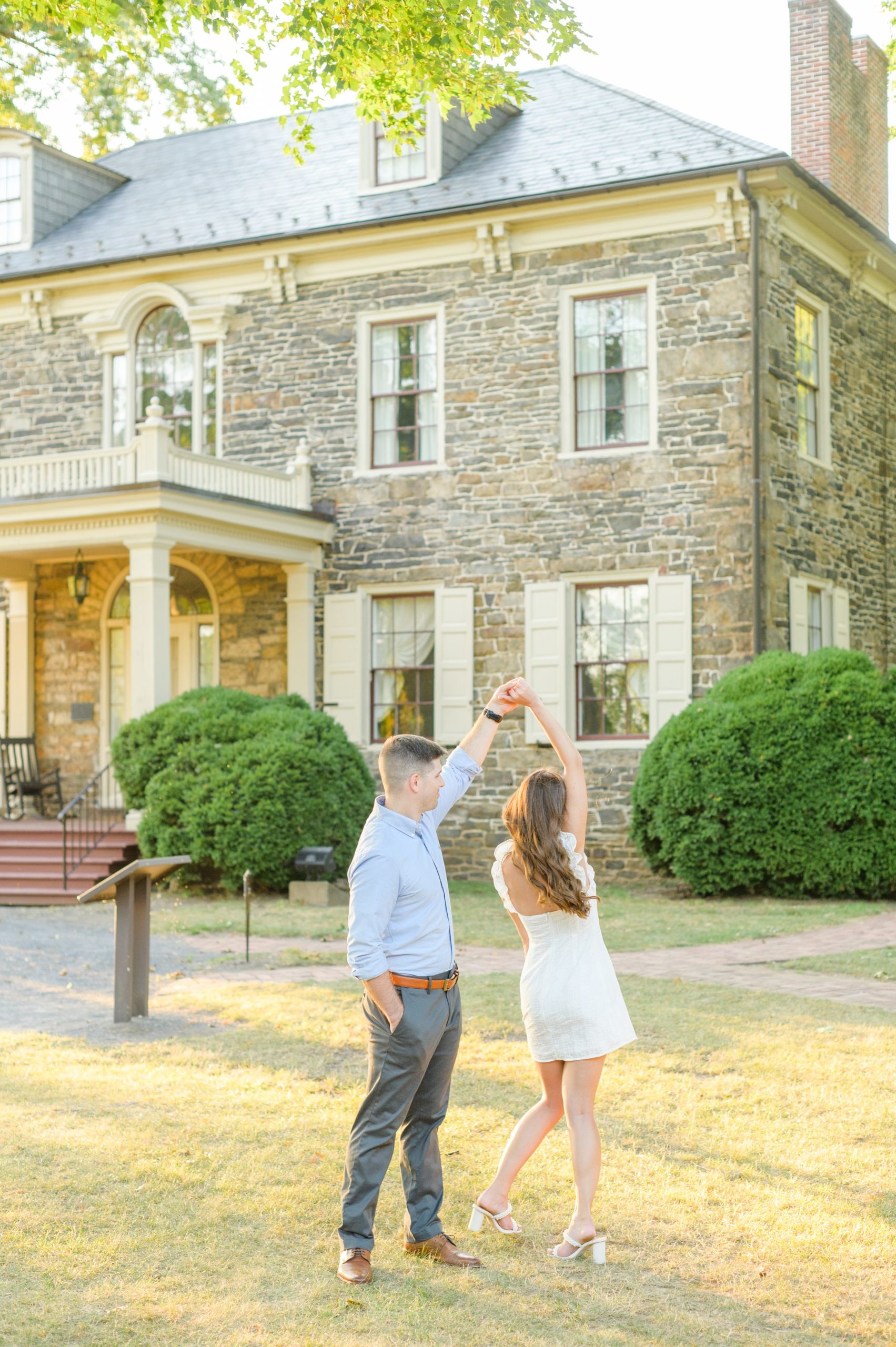 Engaged couple at a local park for their summer engagement session at Fort Hunter Mansion and Park in Harrisburg, Pennsylvania photographed by Baltimore Wedding Photographer Cait Kramer Photography