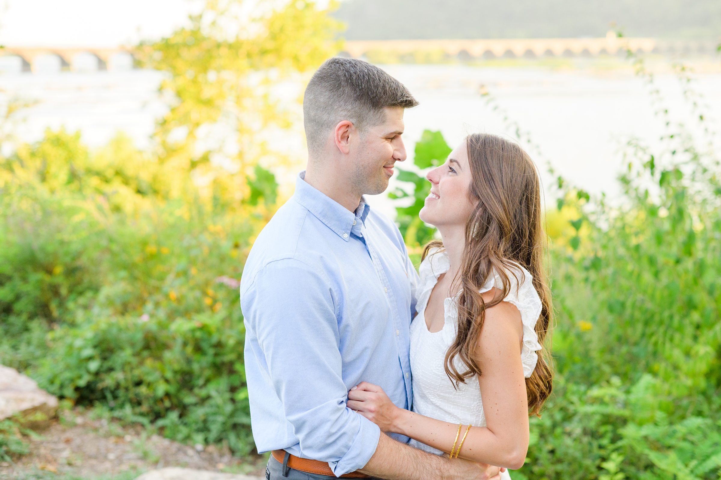 Engaged couple at a local park for their summer engagement session at Fort Hunter Mansion and Park in Harrisburg, Pennsylvania photographed by Baltimore Wedding Photographer Cait Kramer Photography