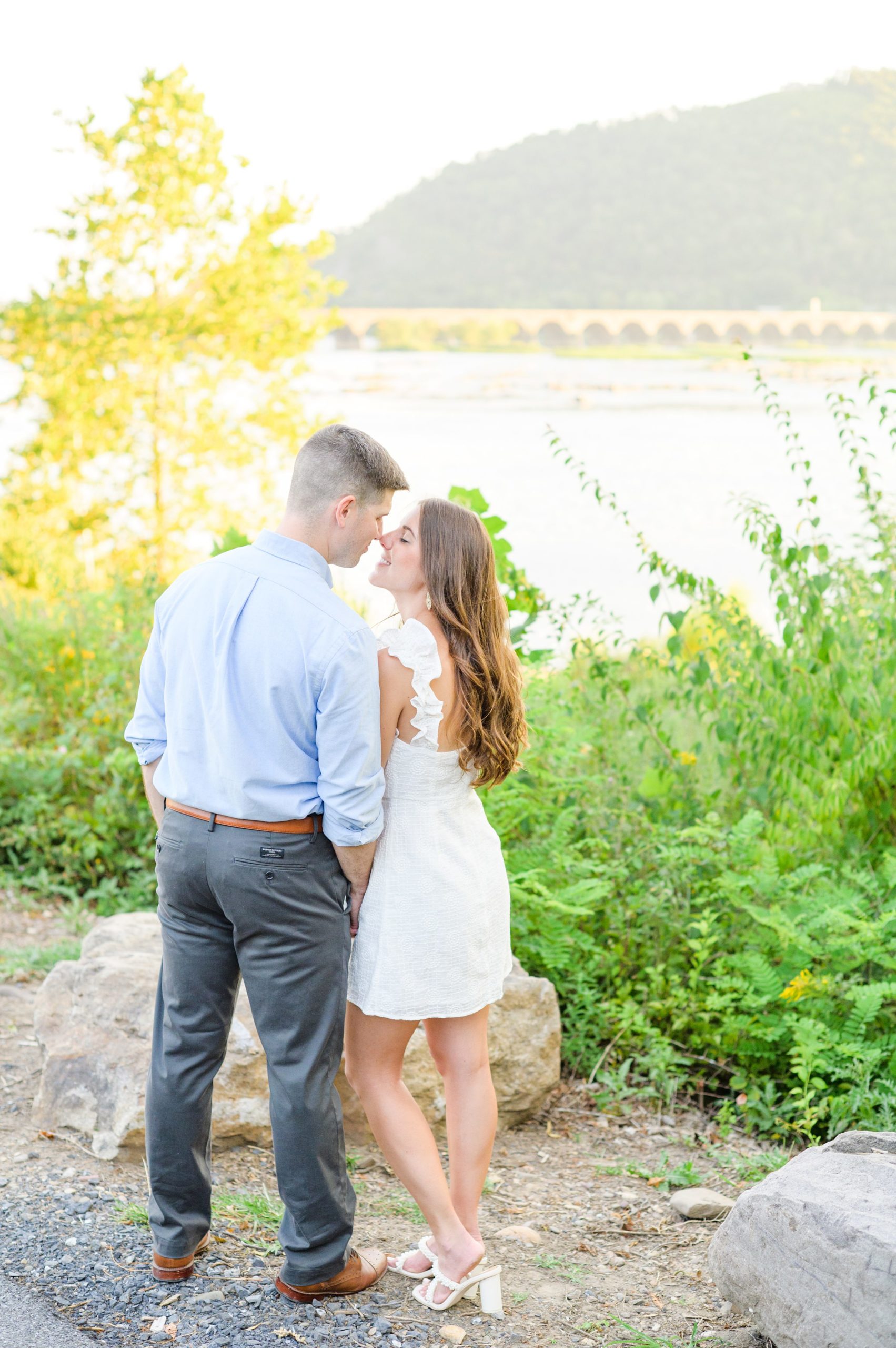 Engaged couple at a local park for their summer engagement session at Fort Hunter Mansion and Park in Harrisburg, Pennsylvania photographed by Baltimore Wedding Photographer Cait Kramer Photography