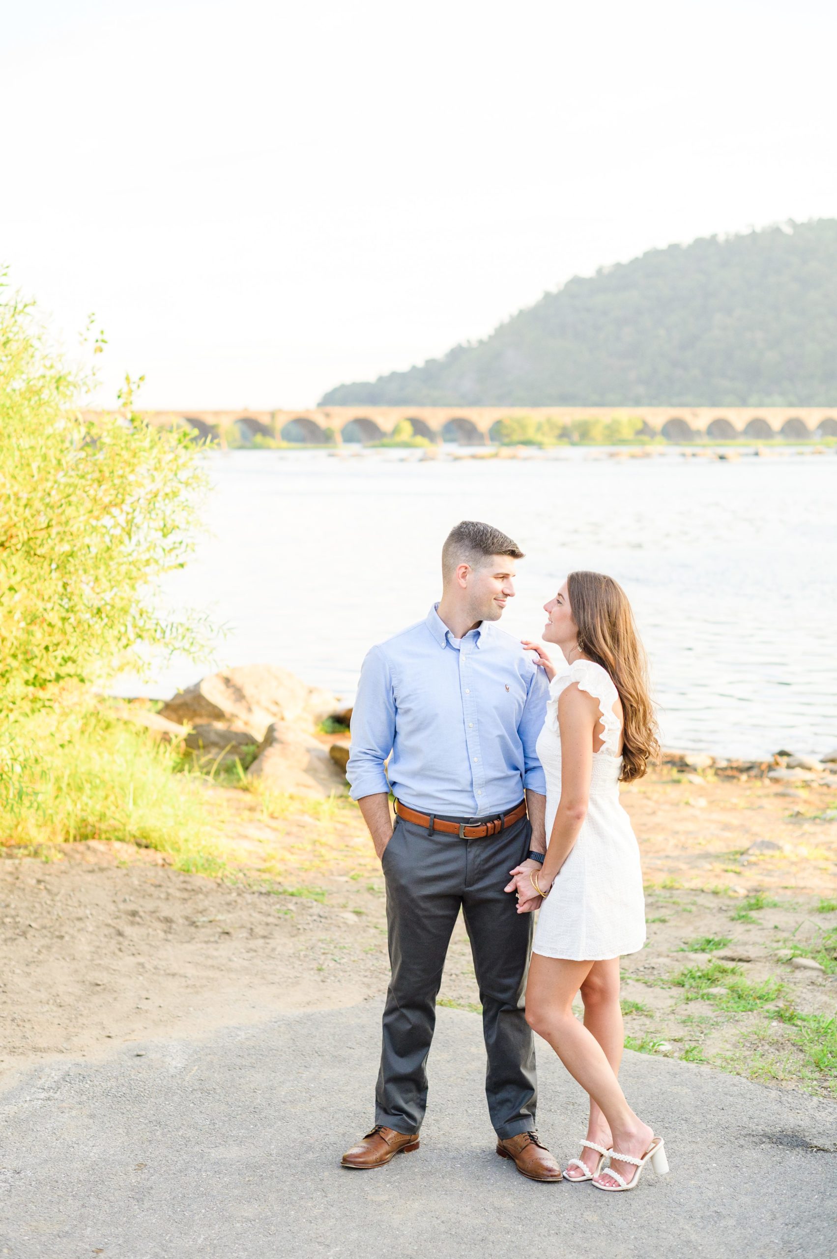 Engaged couple at a local park for their summer engagement session at Fort Hunter Mansion and Park in Harrisburg, Pennsylvania photographed by Baltimore Wedding Photographer Cait Kramer Photography