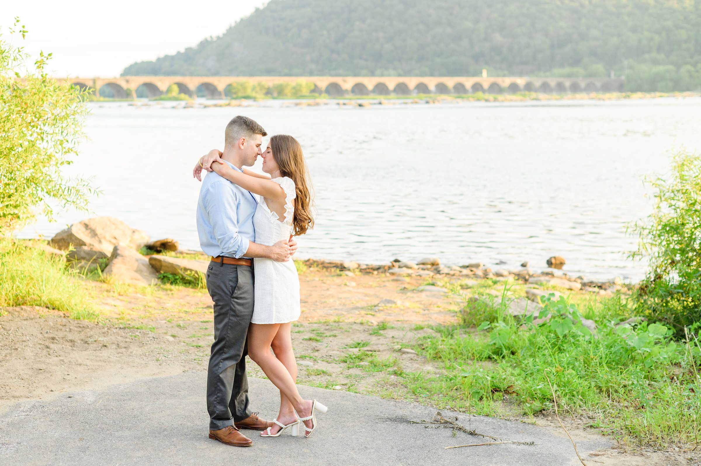 Engaged couple at a local park for their summer engagement session at Fort Hunter Mansion and Park in Harrisburg, Pennsylvania photographed by Baltimore Wedding Photographer Cait Kramer Photography