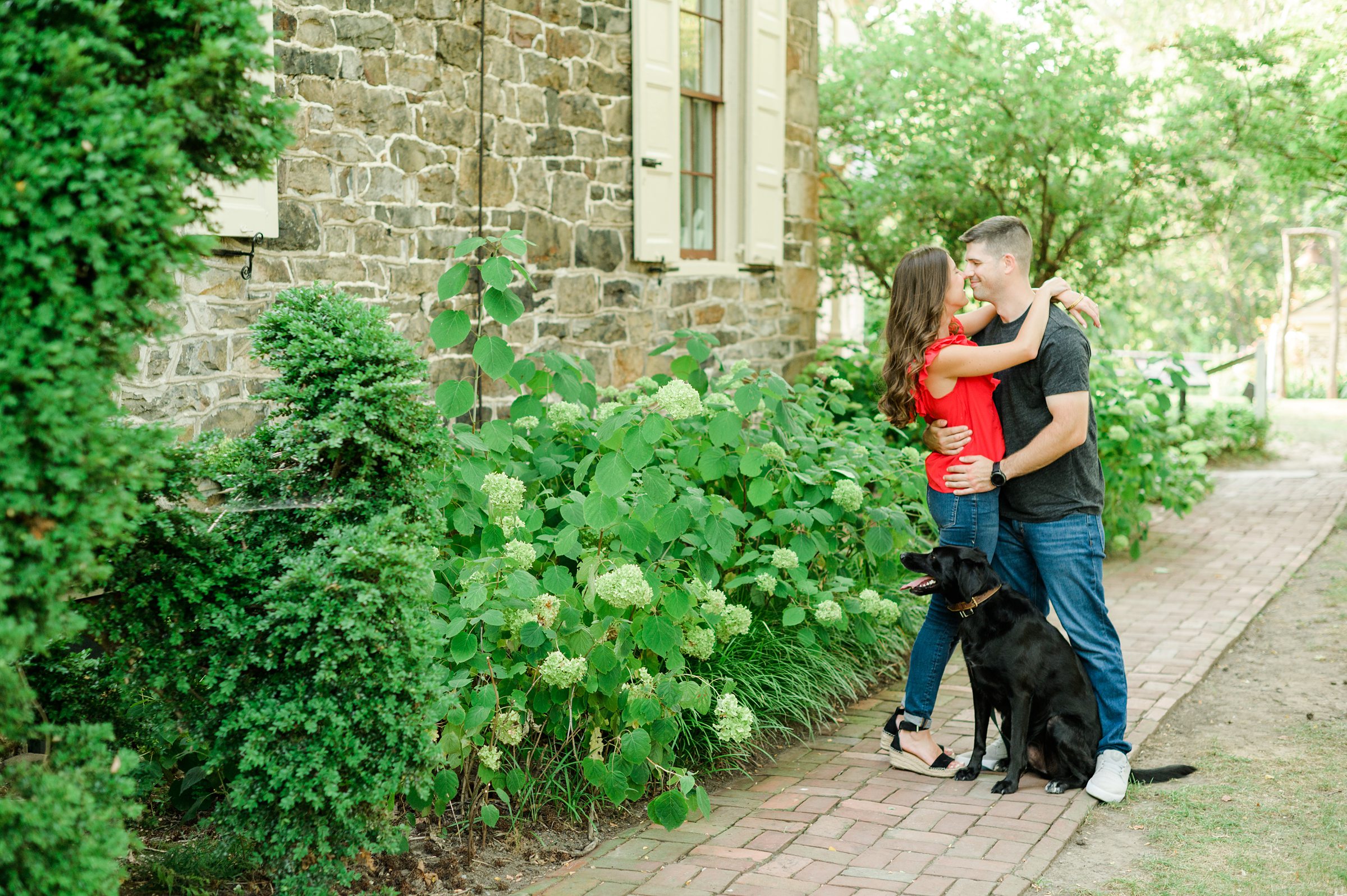 Engaged couple at a local park for their summer engagement session at Fort Hunter Mansion and Park in Harrisburg, Pennsylvania photographed by Baltimore Wedding Photographer Cait Kramer Photography