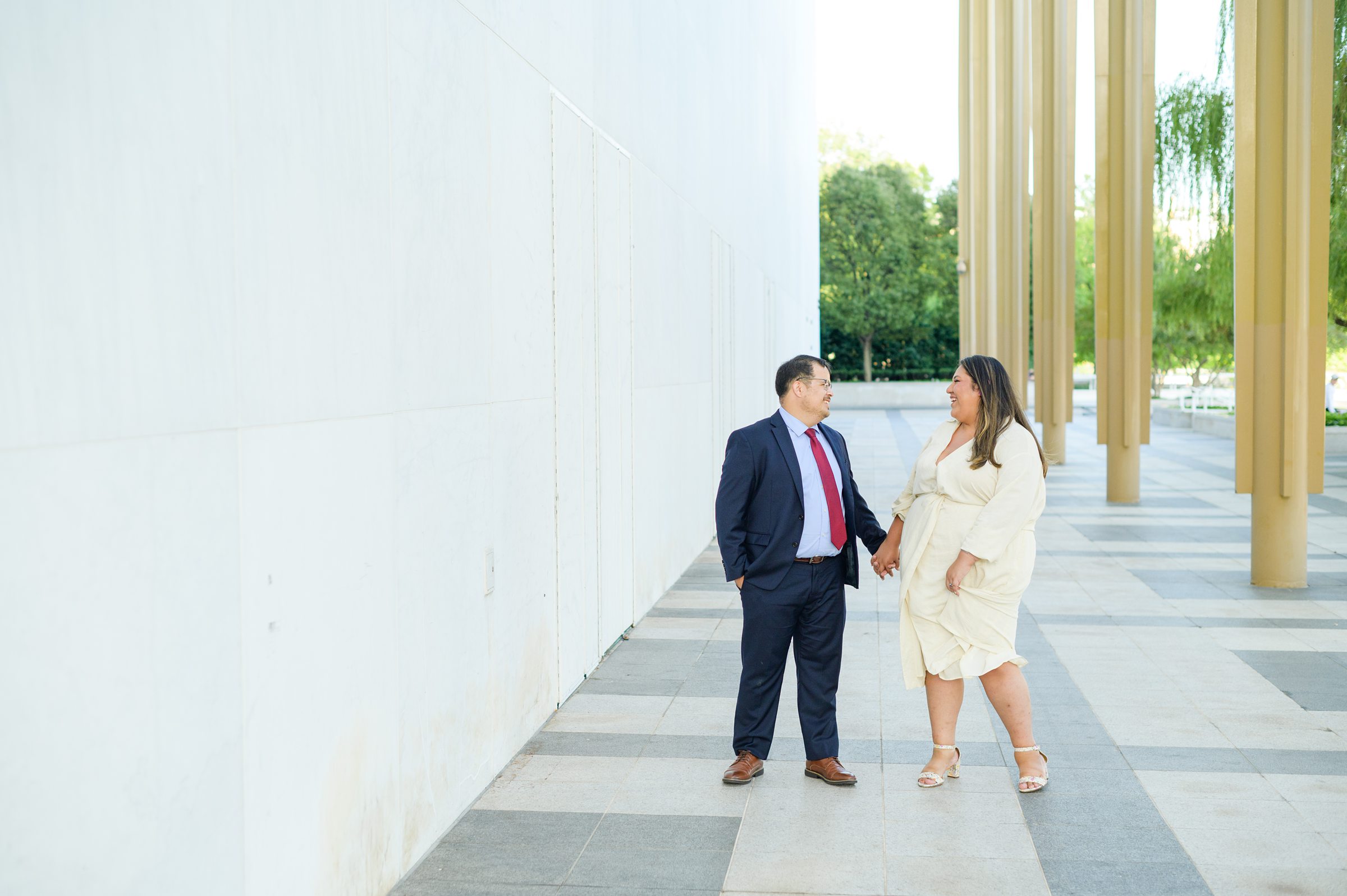 Engaged couple at the Kennedy Center for their summer engagement session Washington, D.C. photographed by Baltimore Wedding Photographer Cait Kramer Photography