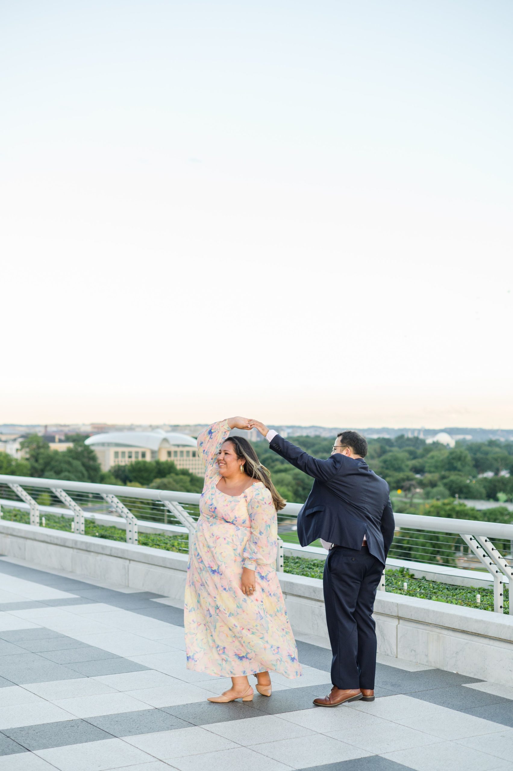 Engaged couple at the Kennedy Center for their summer engagement session Washington, D.C. photographed by Baltimore Wedding Photographer Cait Kramer Photography