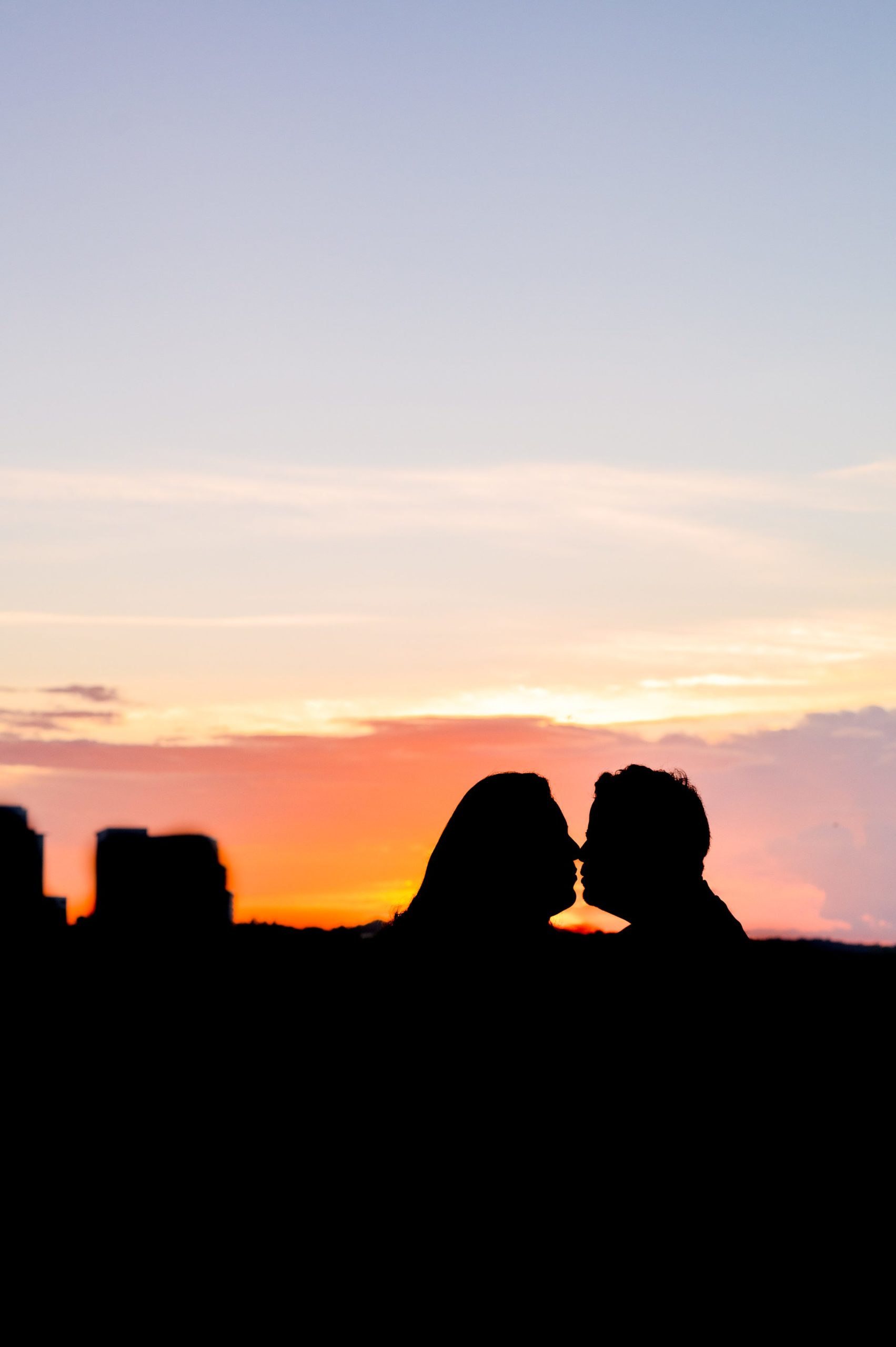 Engaged couple at the Kennedy Center for their summer engagement session Washington, D.C. photographed by Baltimore Wedding Photographer Cait Kramer Photography