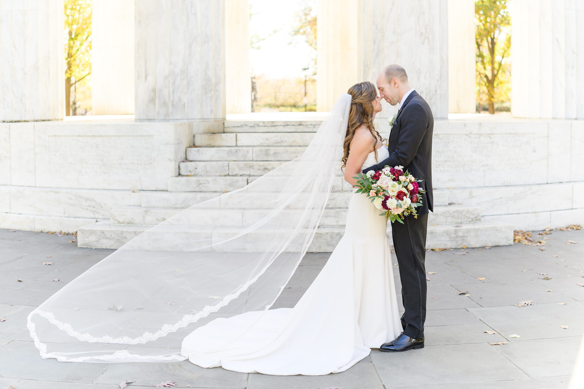 Burgundy and white Fall wedding day portraits and details featuring Mayflower Hotel DC wedding photos photographed by Baltimore wedding photographer Cait Kramer Photography