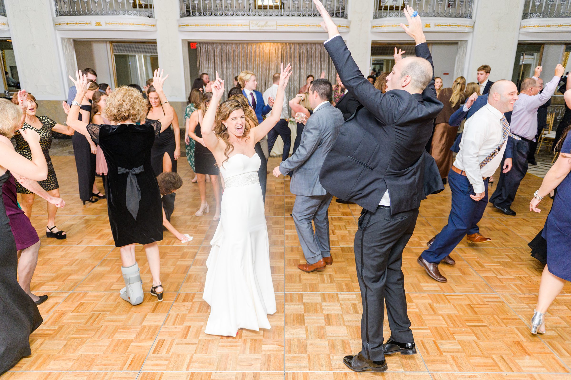 Burgundy and white Fall wedding day portraits and details featuring Mayflower Hotel DC wedding photos photographed by Baltimore wedding photographer Cait Kramer Photography