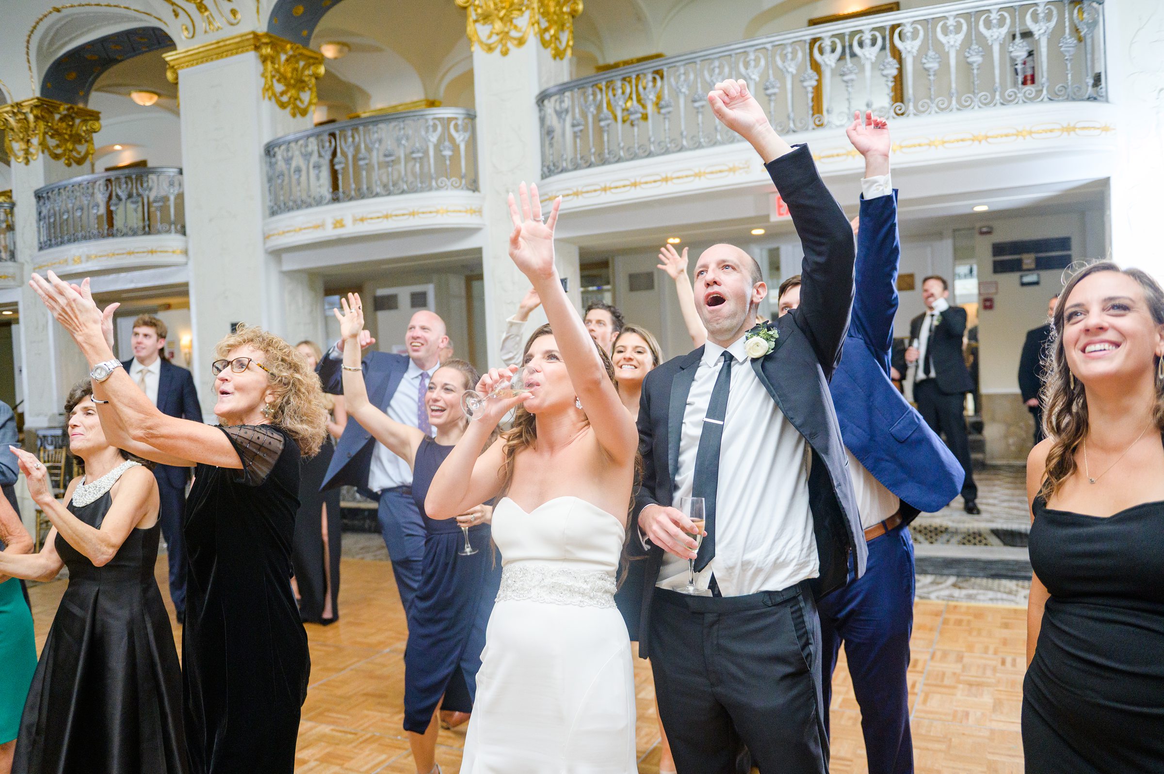 Burgundy and white Fall wedding day portraits and details featuring Mayflower Hotel DC wedding photos photographed by Baltimore wedding photographer Cait Kramer Photography