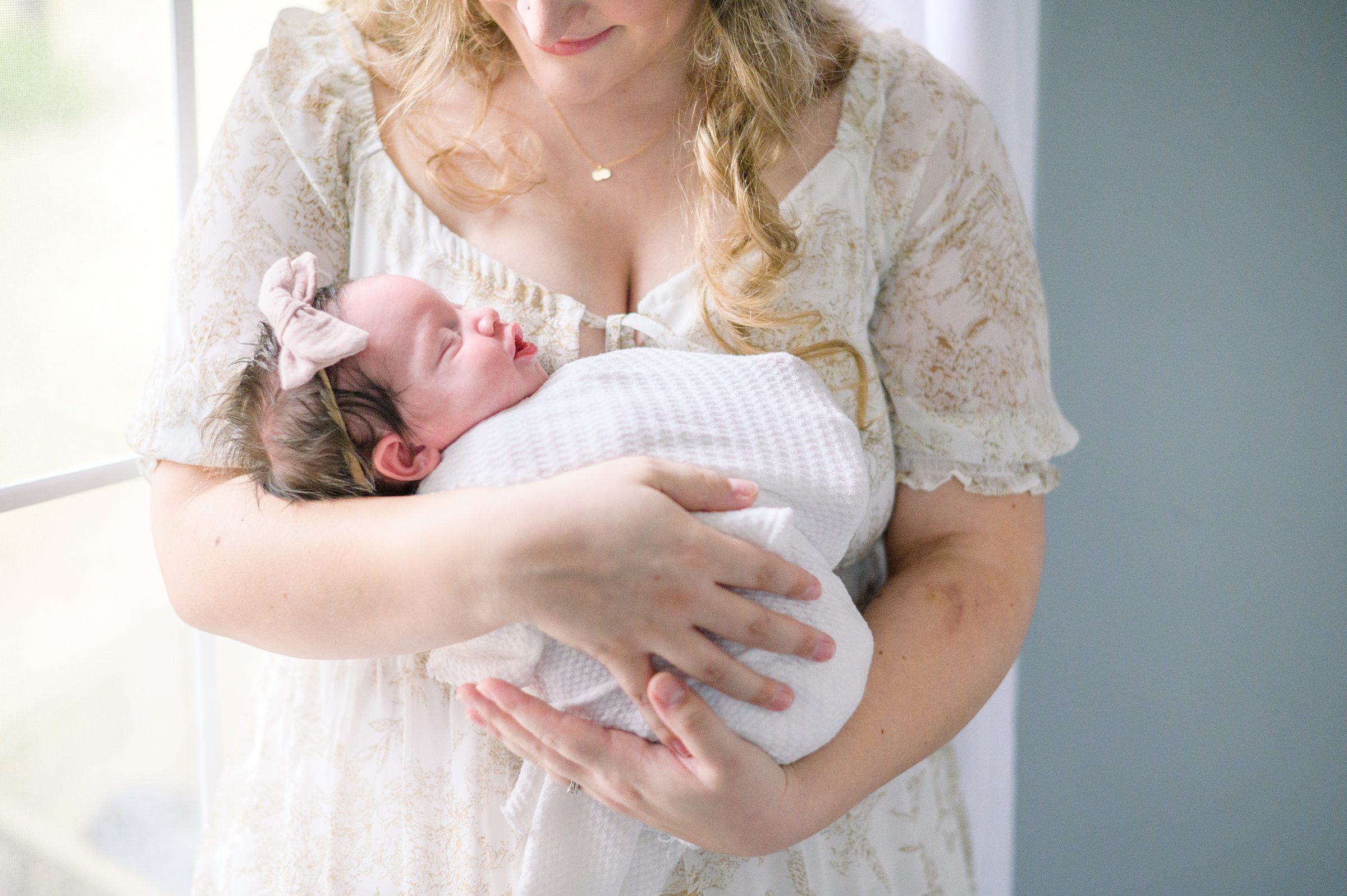 In home newborn photography session photographed by Baltimore Newborn Photographer Cait Kramer