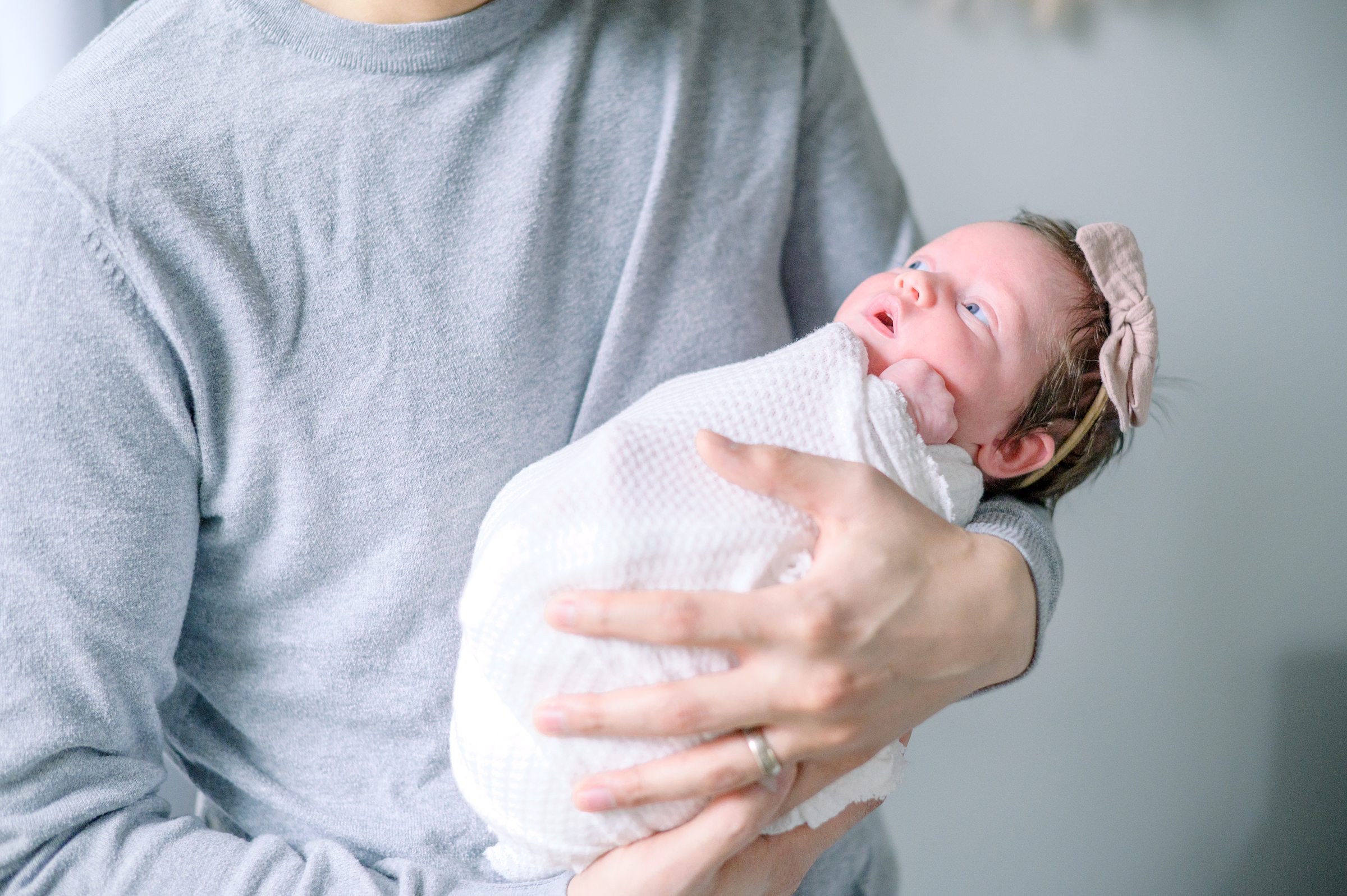 In home newborn photography session photographed by Baltimore Newborn Photographer Cait Kramer