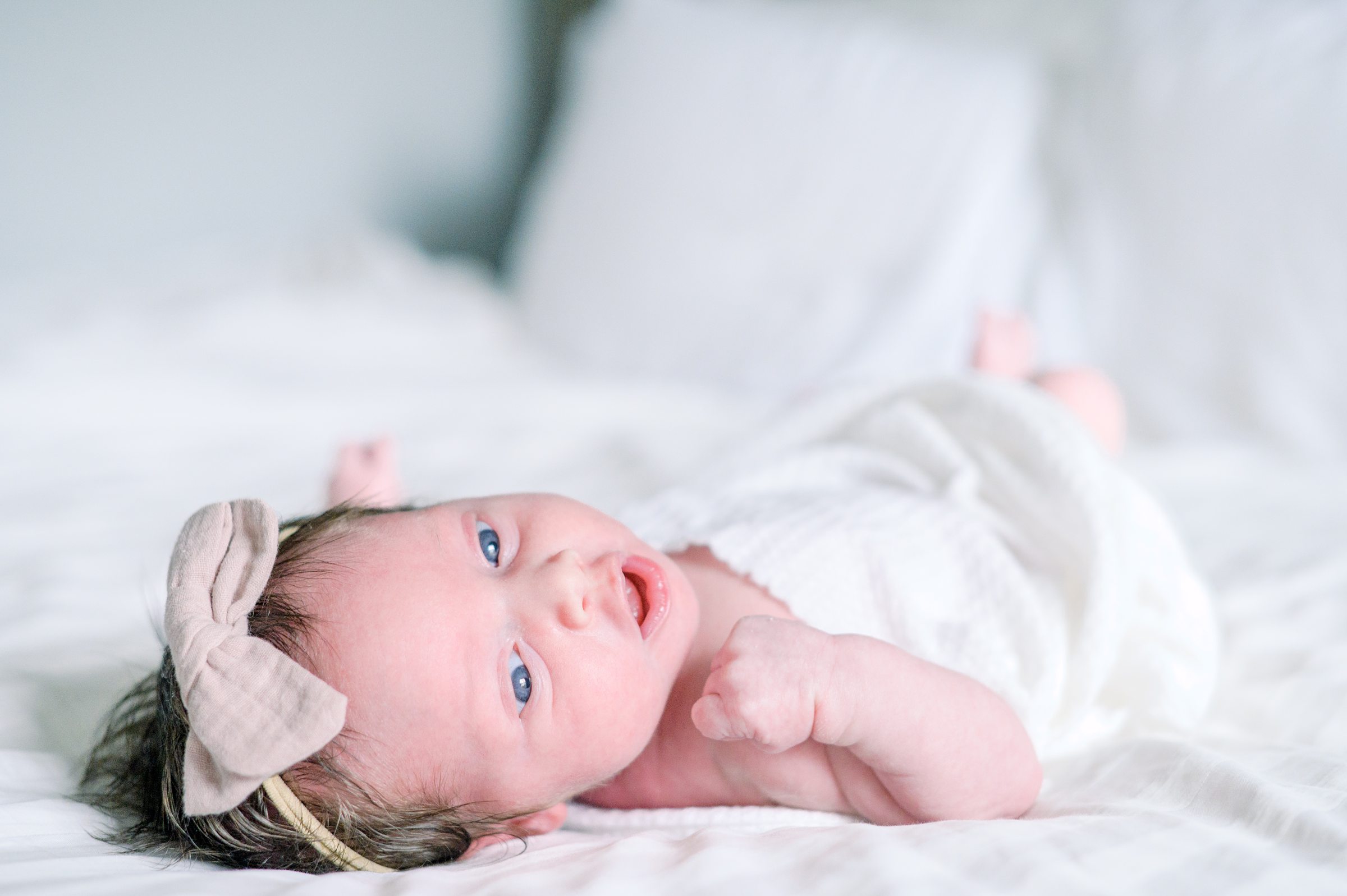 In home newborn photography session photographed by Baltimore Newborn Photographer Cait Kramer