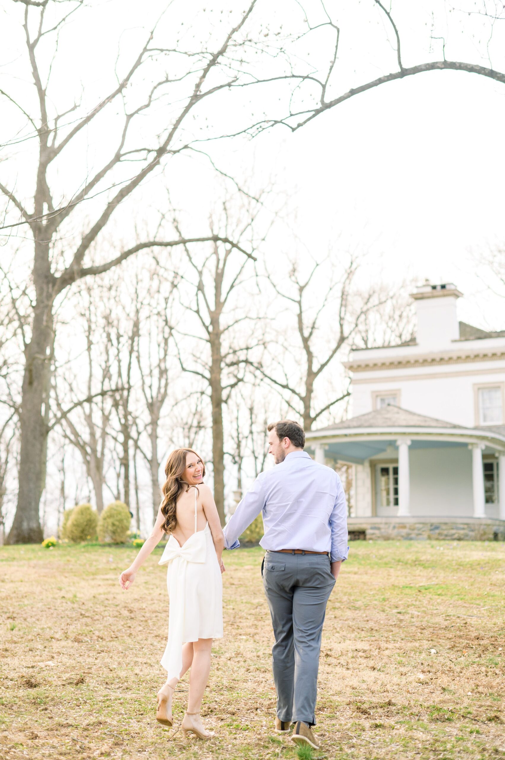 Engaged couple at Liriodendron Mansion in Bel Air, Maryland for their engagement session photographed by Baltimore Wedding Photographer Cait Kramer Photography