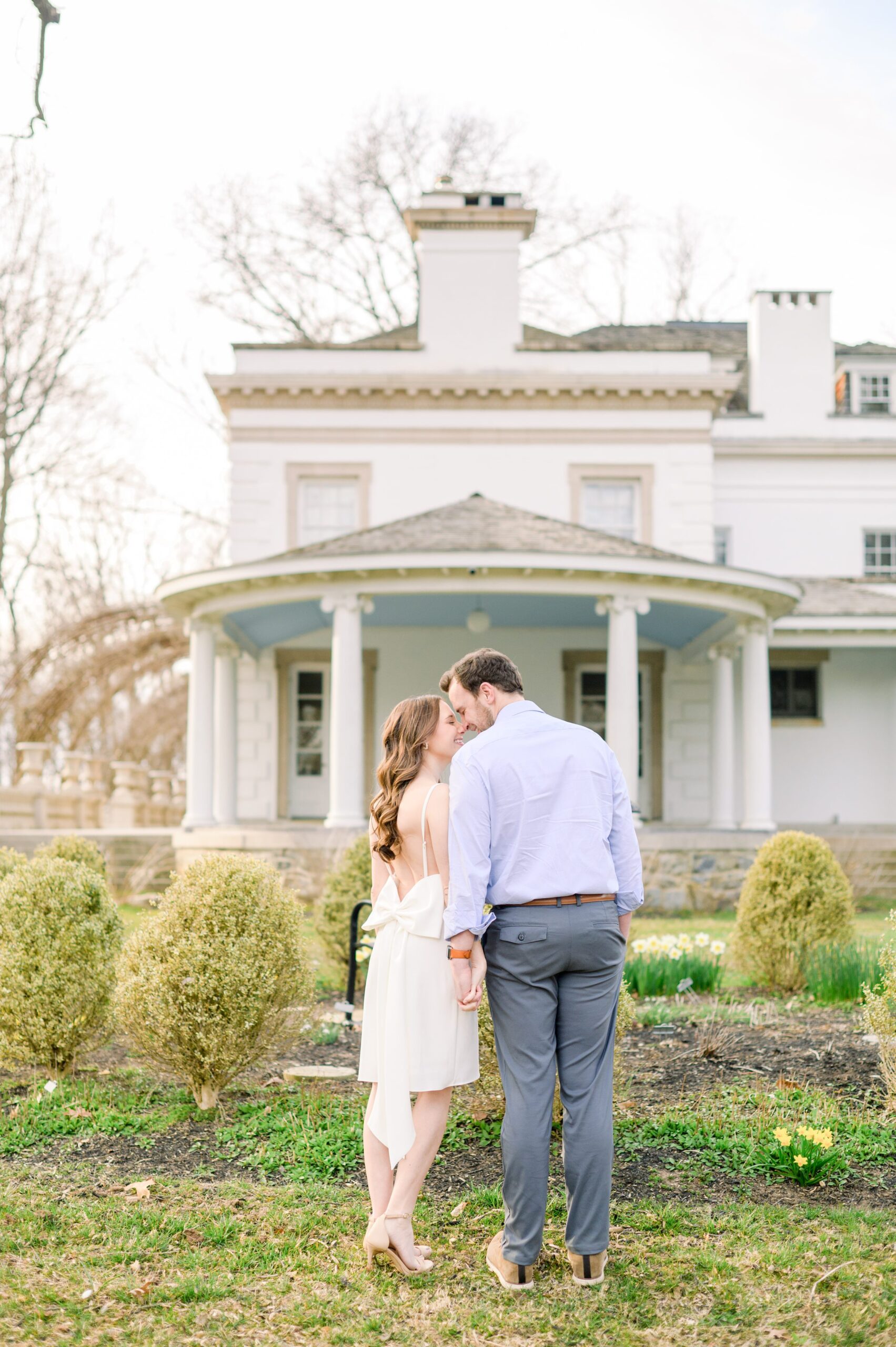 Engaged couple at Liriodendron Mansion in Bel Air, Maryland for their engagement session photographed by Baltimore Wedding Photographer Cait Kramer Photography