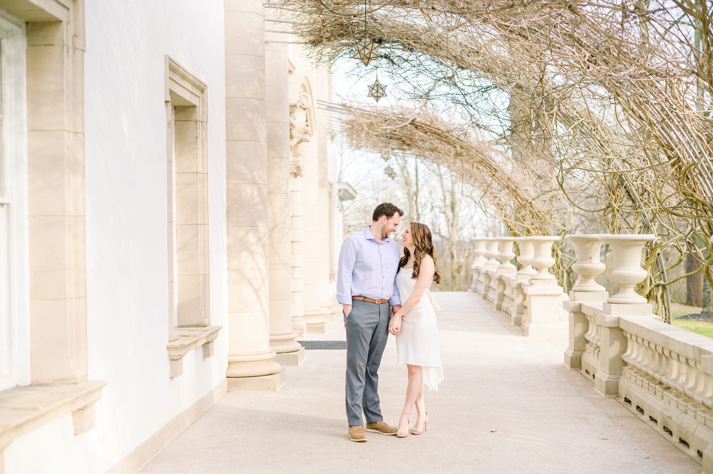 Engaged couple at Liriodendron Mansion in Bel Air, Maryland for their engagement session photographed by Baltimore Wedding Photographer Cait Kramer Photography