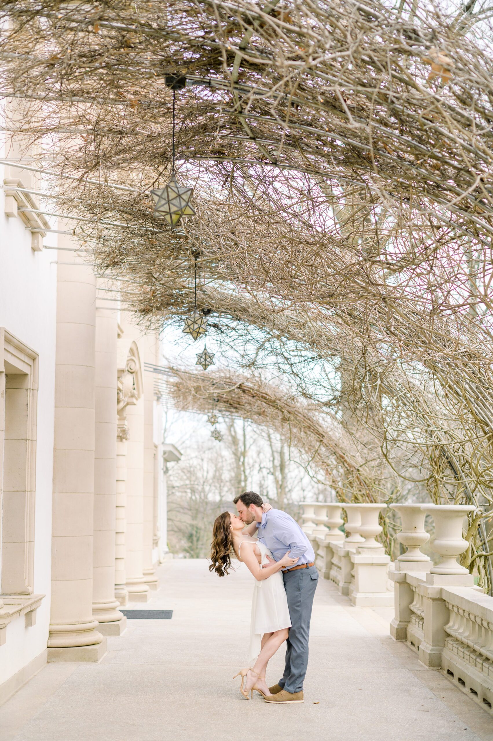 Engaged couple at Liriodendron Mansion in Bel Air, Maryland for their engagement session photographed by Baltimore Wedding Photographer Cait Kramer Photography