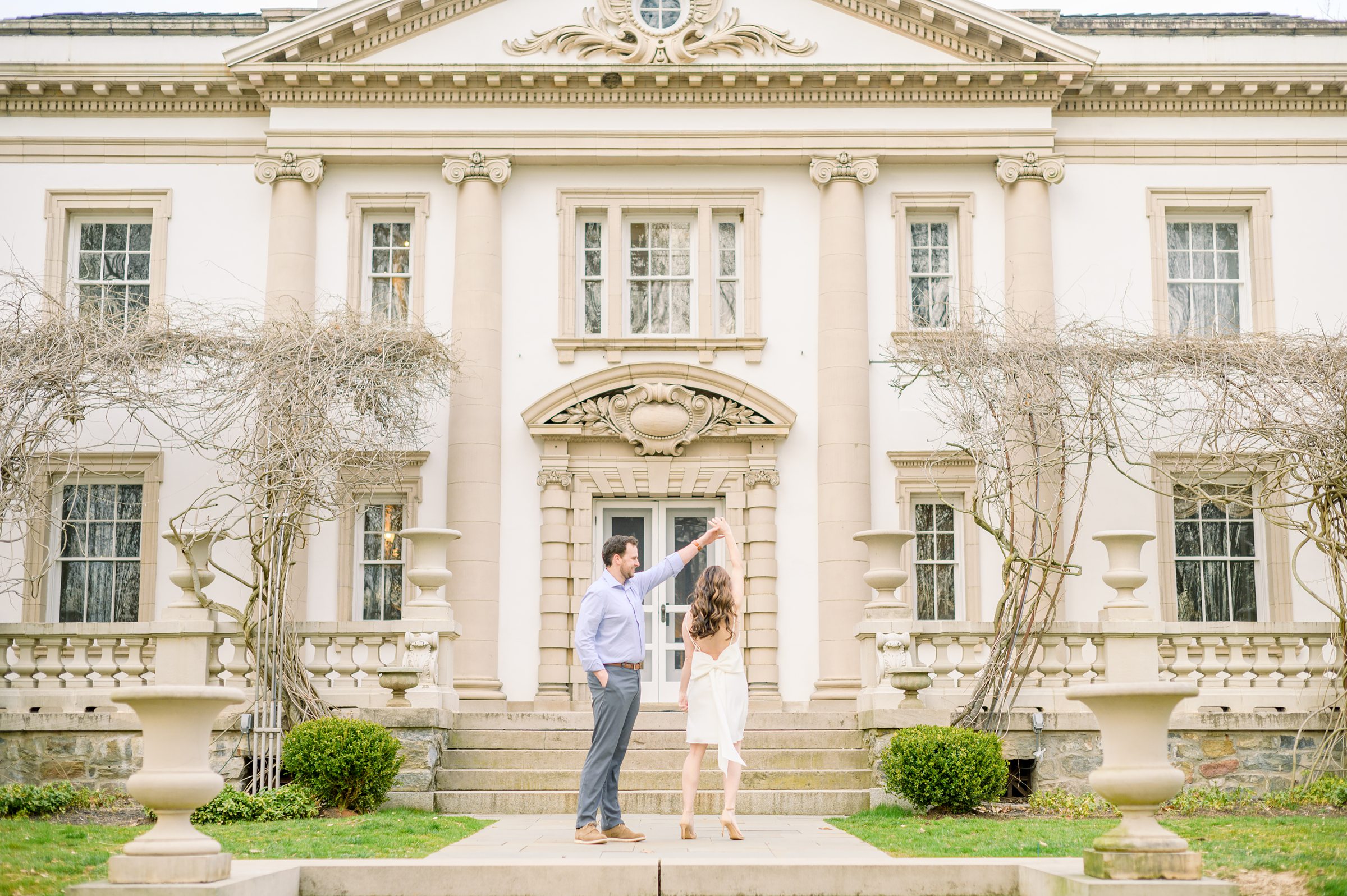 Engaged couple at Liriodendron Mansion in Bel Air, Maryland for their engagement session photographed by Baltimore Wedding Photographer Cait Kramer Photography