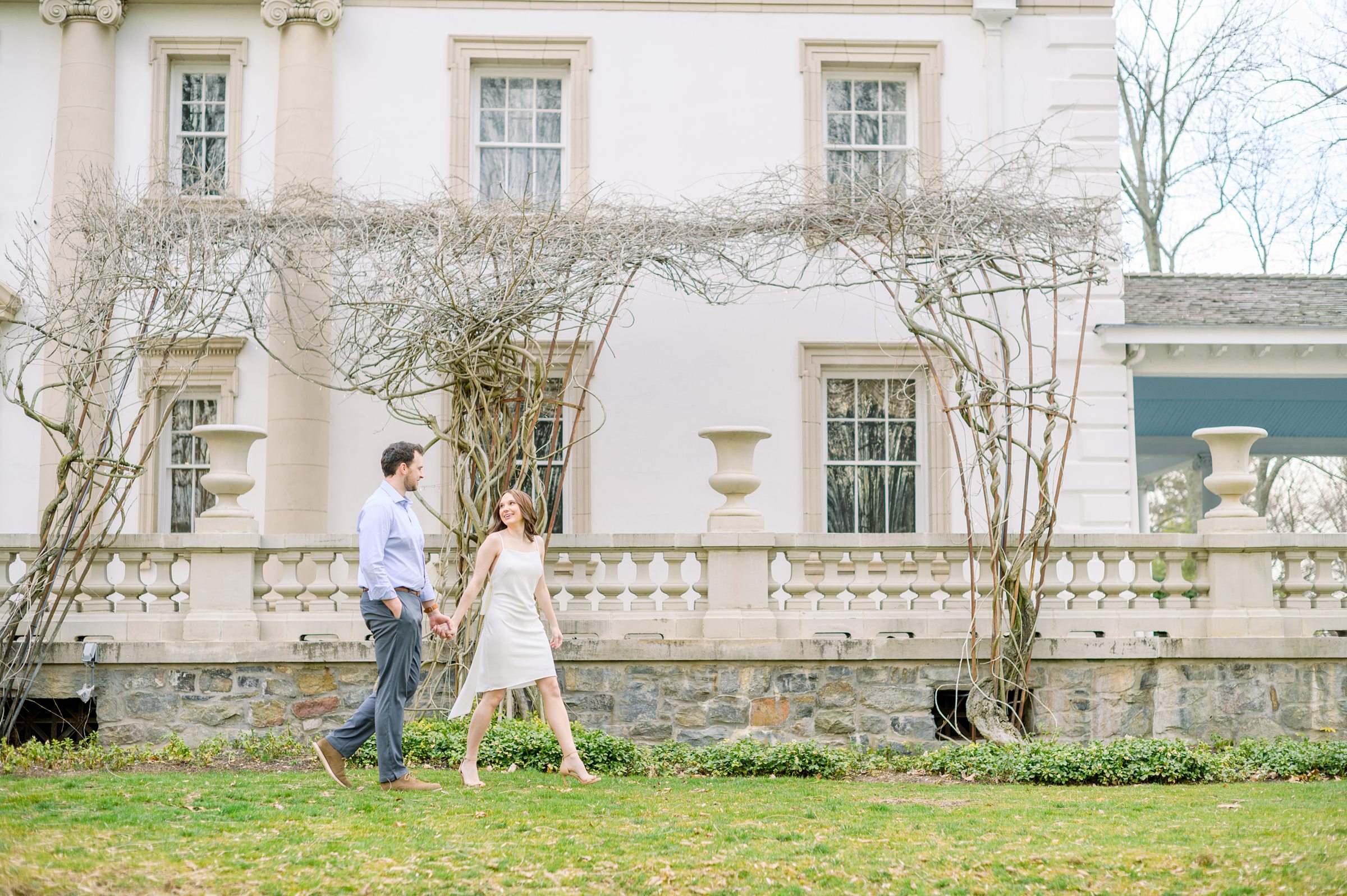 Engaged couple at Liriodendron Mansion in Bel Air, Maryland for their engagement session photographed by Baltimore Wedding Photographer Cait Kramer Photography