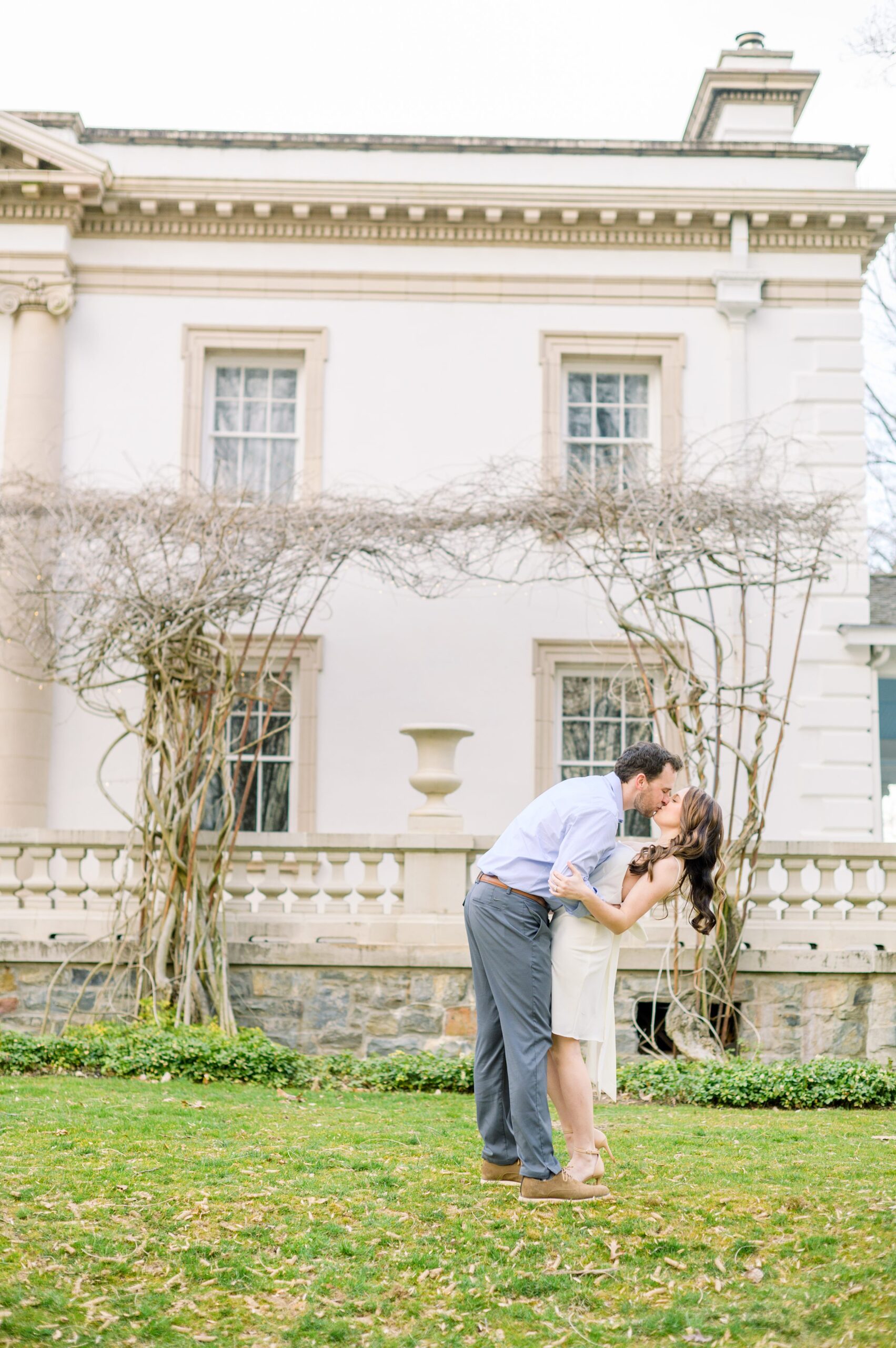 Engaged couple at Liriodendron Mansion in Bel Air, Maryland for their engagement session photographed by Baltimore Wedding Photographer Cait Kramer Photography