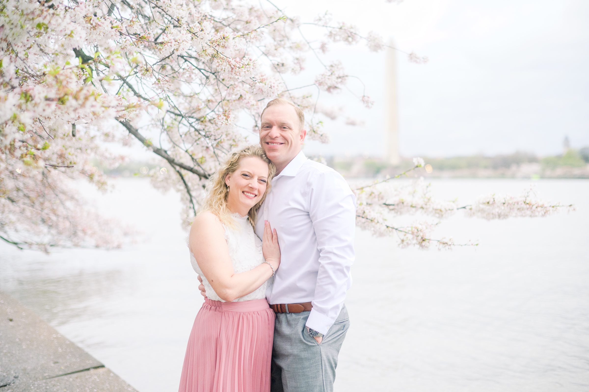 Anniversary portrait session at the Jefferson Memorial featuring the Washington DC Cherry Blossoms. Photographed by Baltimore Photographer Cait Kramer Photography