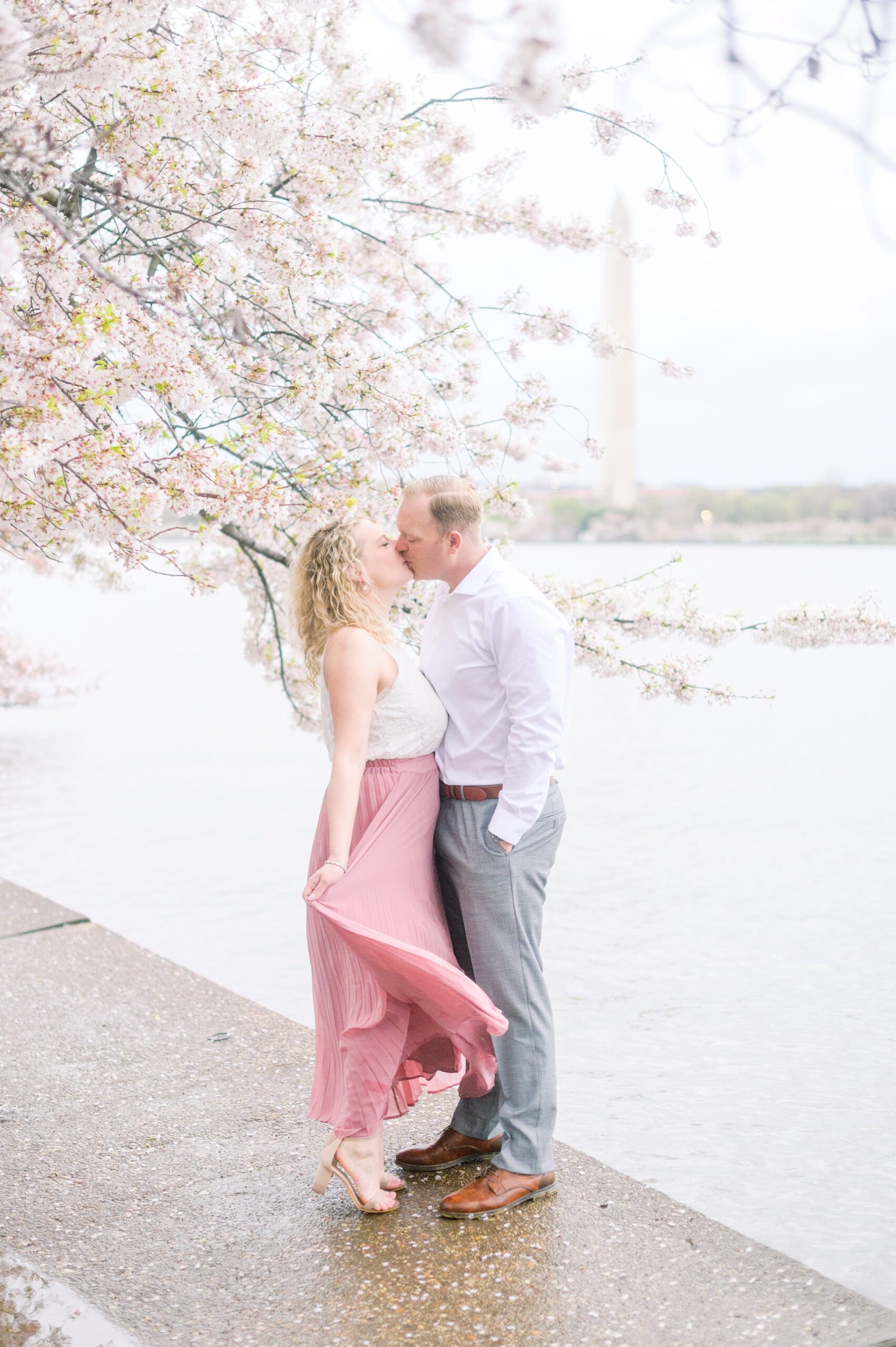 Anniversary portrait session at the Jefferson Memorial featuring the Washington DC Cherry Blossoms. Photographed by Baltimore Photographer Cait Kramer Photography