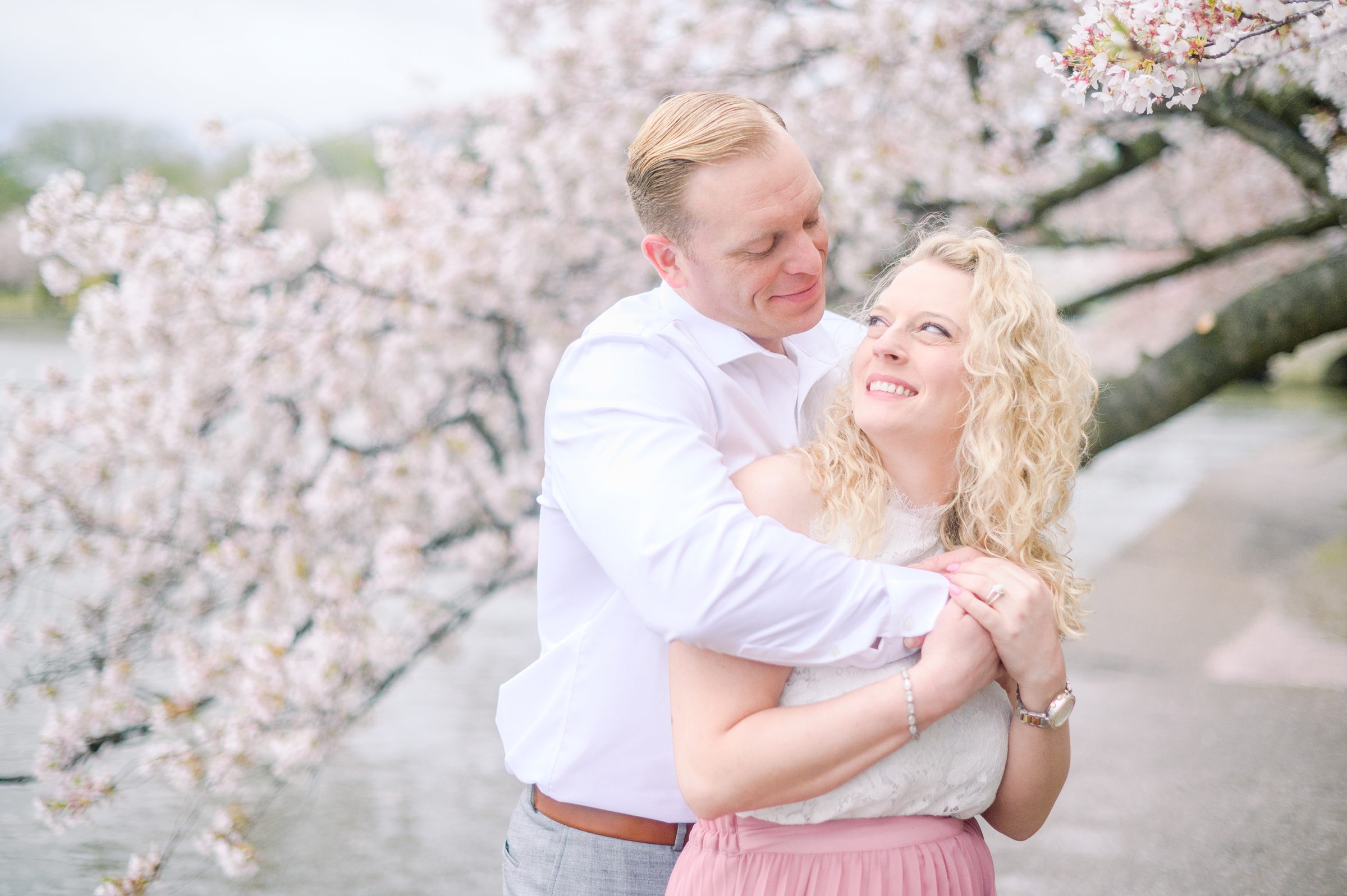 Portrait session at the Jefferson Memorial featuring the Washington DC Cherry Blossoms. Photographed by Baltimore Photographer Cait Kramer Photography