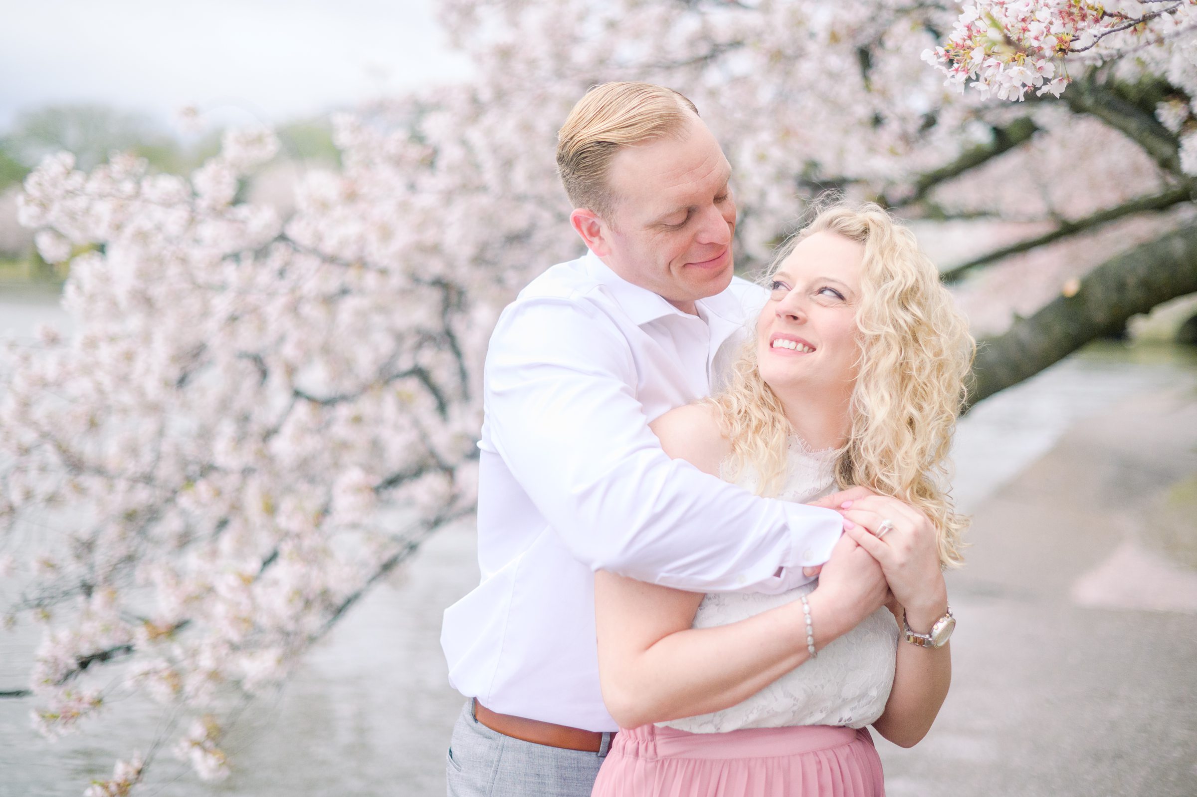 Portrait session at the Jefferson Memorial featuring the Washington DC Cherry Blossoms. Photographed by Baltimore Photographer Cait Kramer Photography