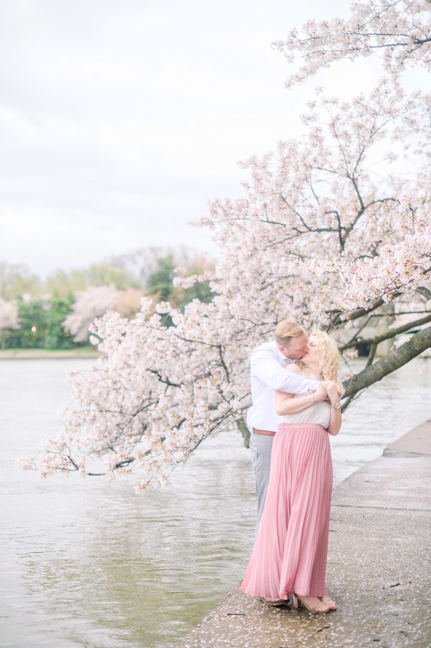 Portrait session at the Jefferson Memorial featuring the Washington DC Cherry Blossoms. Photographed by Baltimore Photographer Cait Kramer Photography