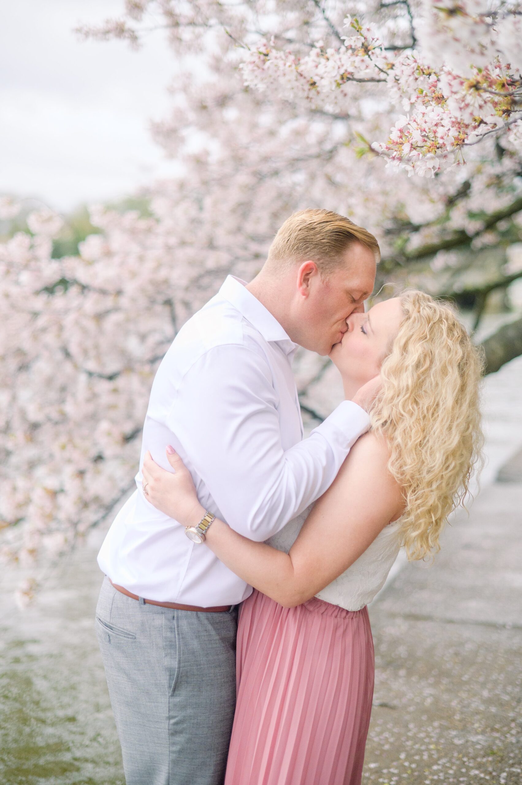 Anniversary portrait session at the Jefferson Memorial featuring the Washington DC Cherry Blossoms. Photographed by Baltimore Photographer Cait Kramer Photography