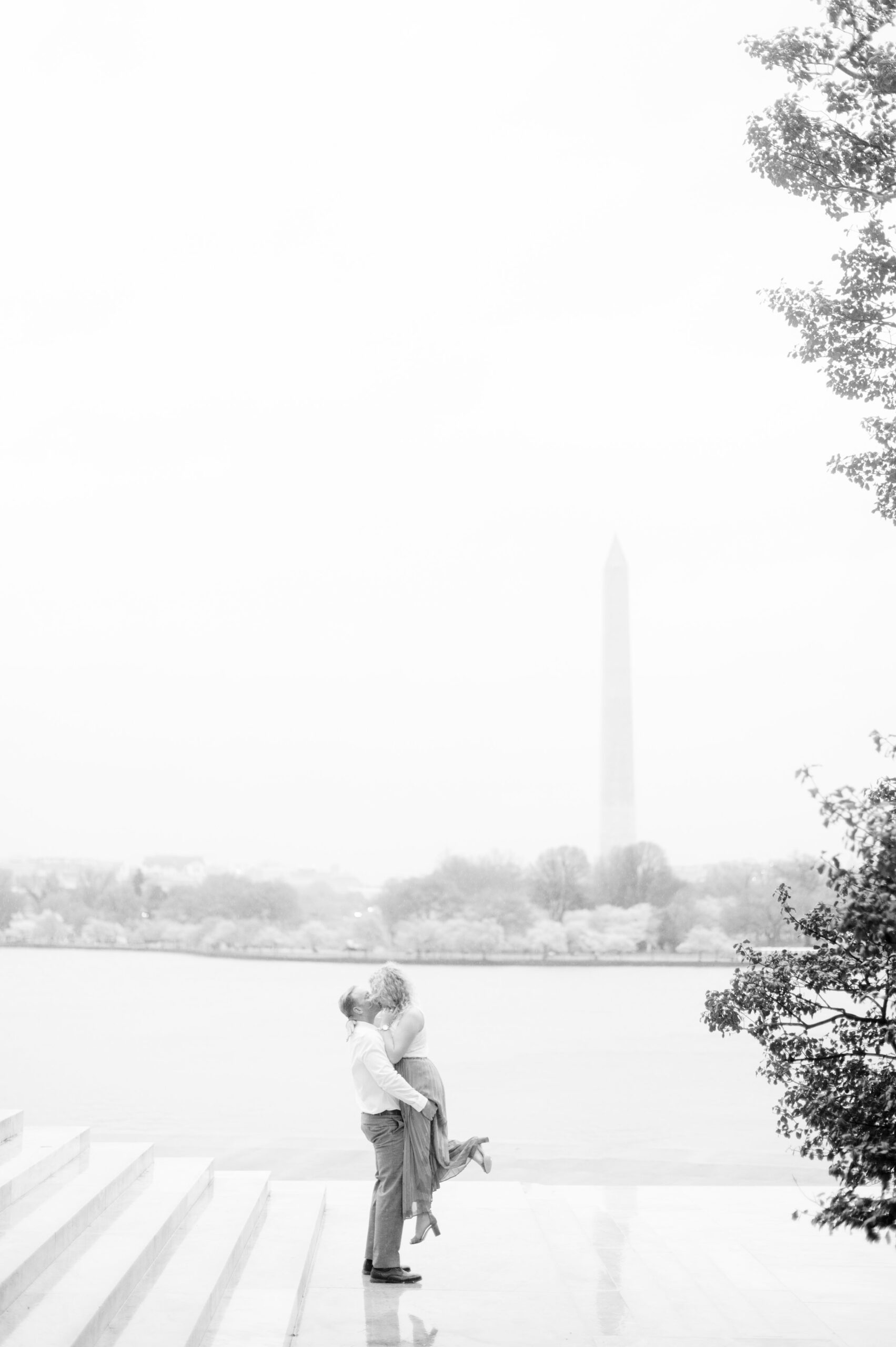 Anniversary portrait session at the Jefferson Memorial featuring the Washington DC Cherry Blossoms. Photographed by Baltimore Photographer Cait Kramer Photography