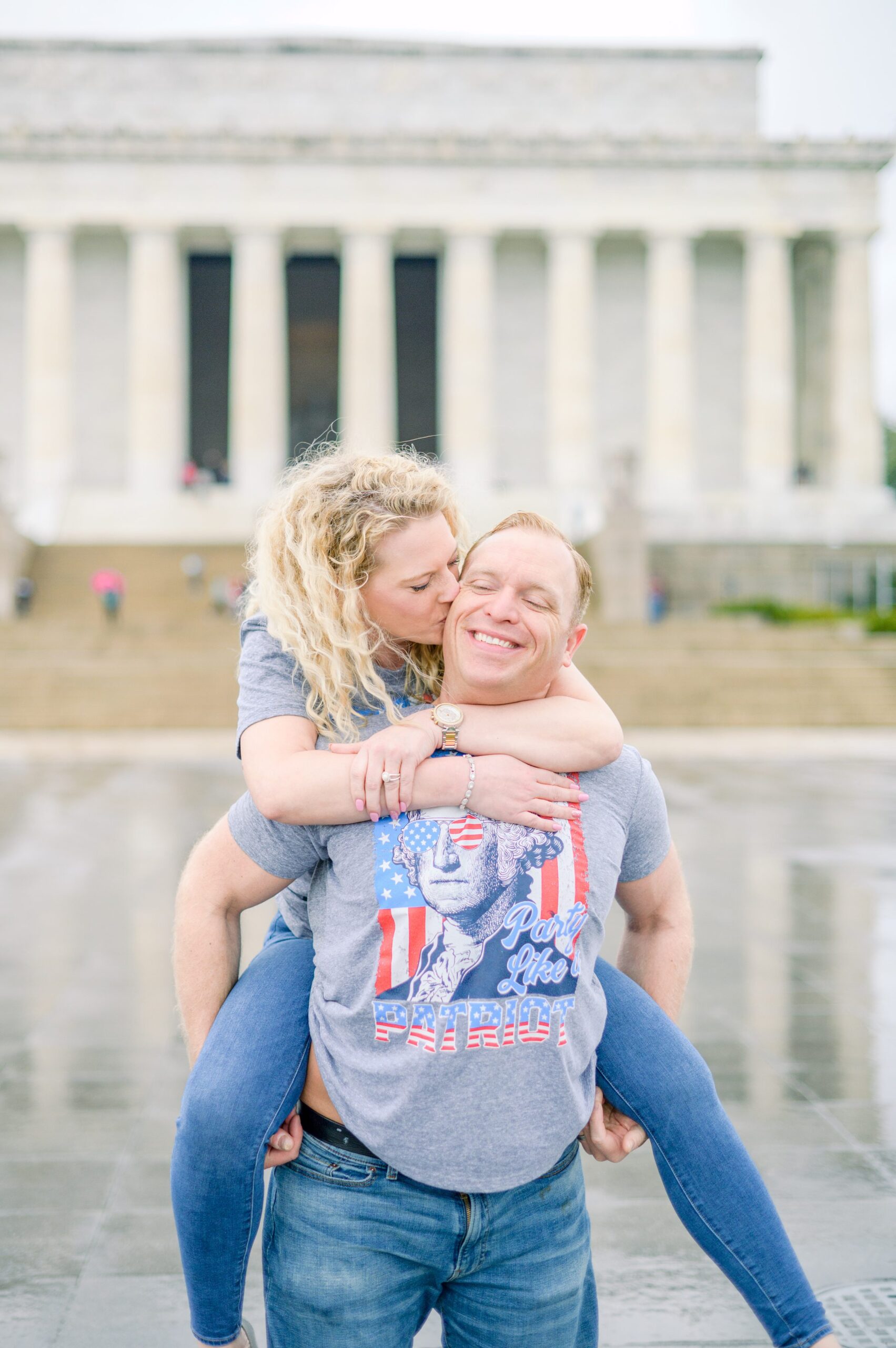 Anniversary portrait session at the Lincoln Memorial featuring the Washington DC Cherry Blossoms. Photographed by Baltimore Photographer Cait Kramer Photography
