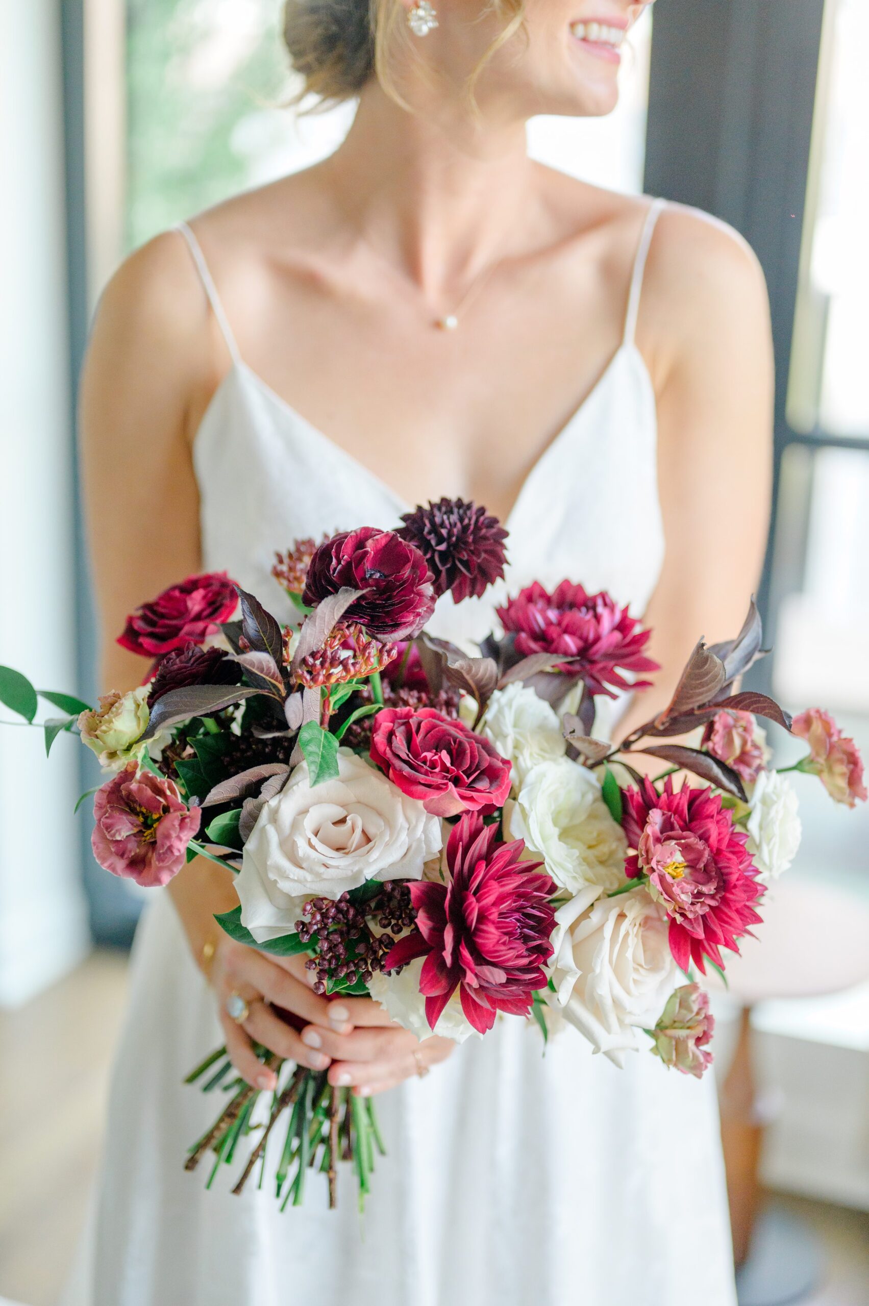 Burgundy fall District Winery wedding day in Washington, DC photographed by Baltimore Wedding Photographer Cait Kramer Photography