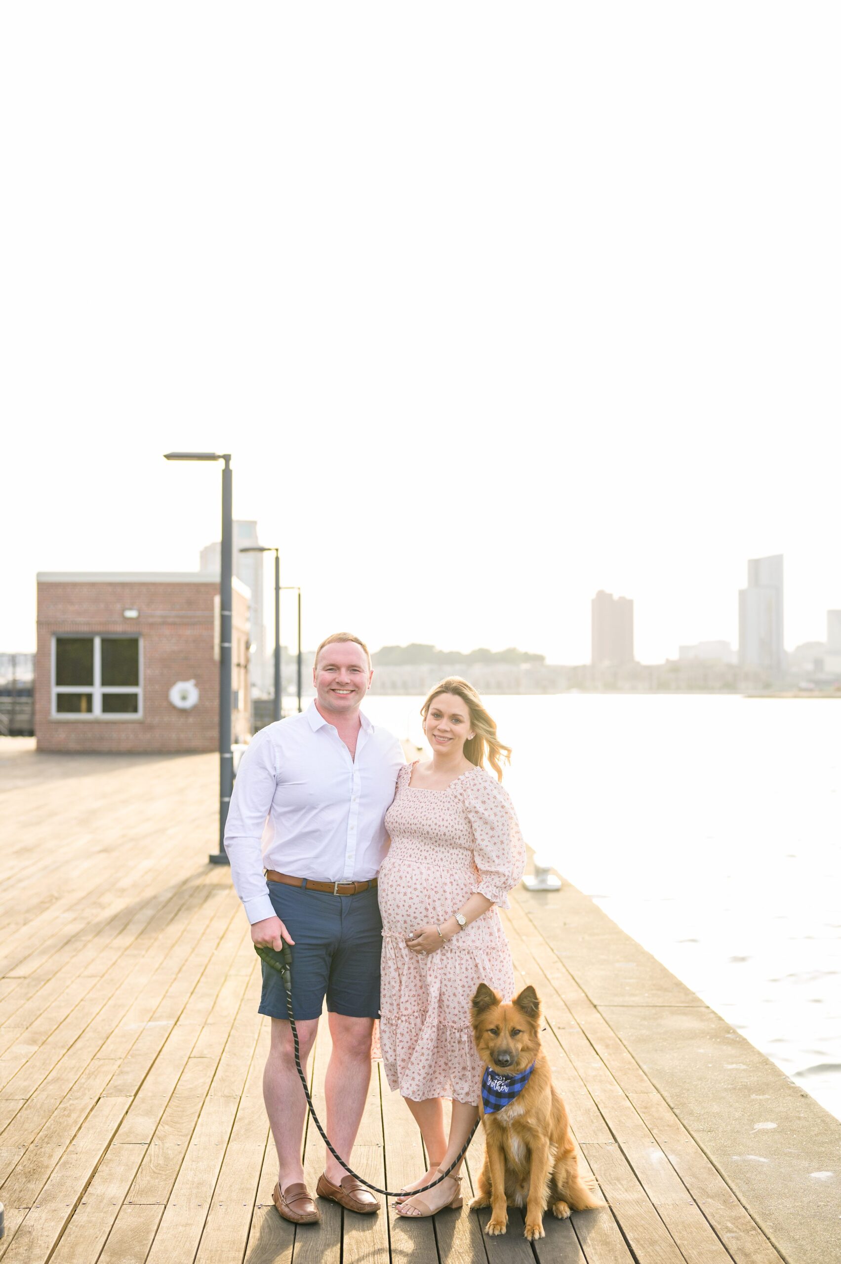 Mary and Adam's maternity session in Locust Point in Baltimore featuring a stunning golden hour by Baltimore Photographer Cait Kramer Photography