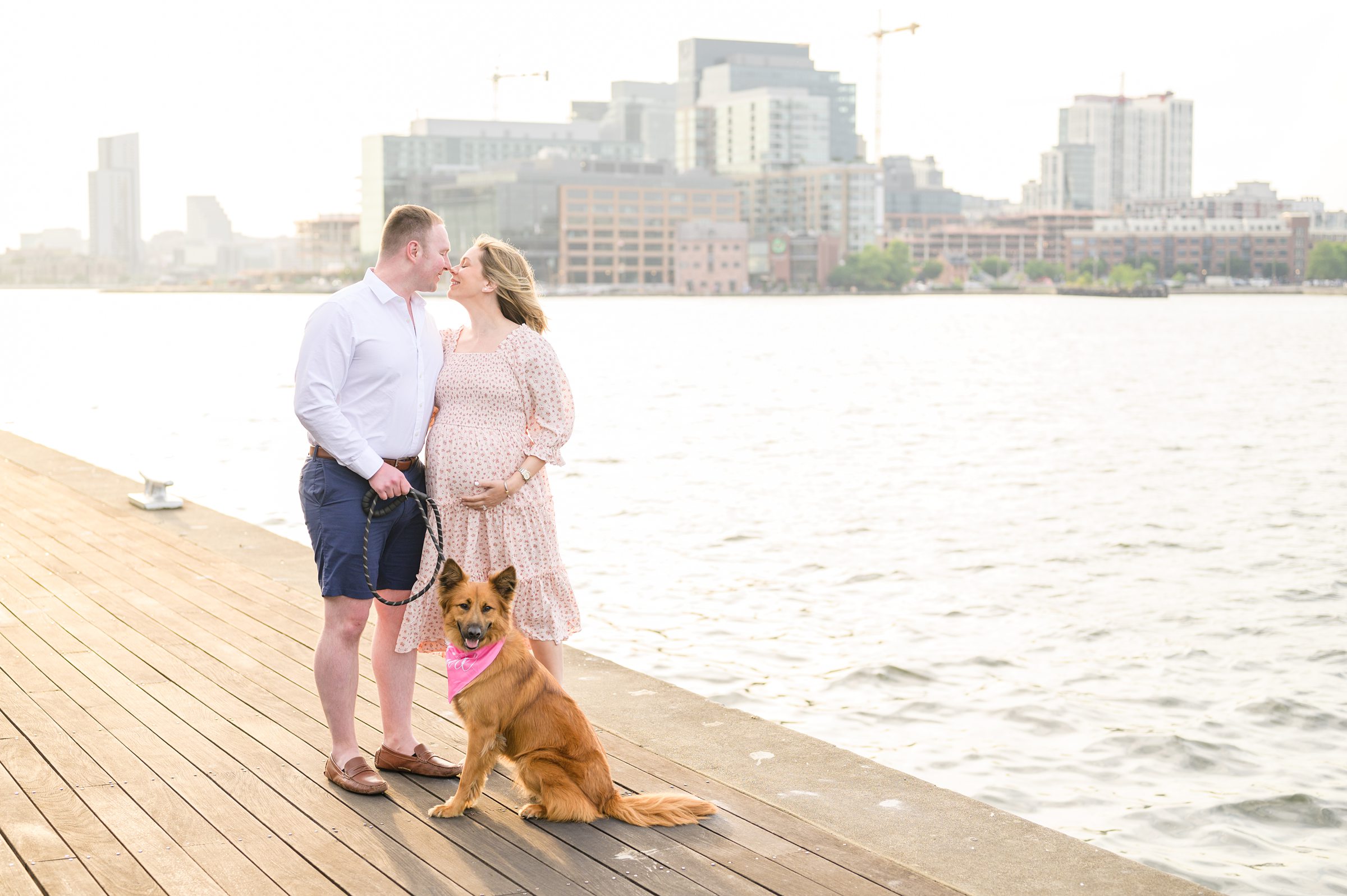 Mary and Adam's maternity session in Locust Point in Baltimore featuring a stunning golden hour by Baltimore Photographer Cait Kramer Photography