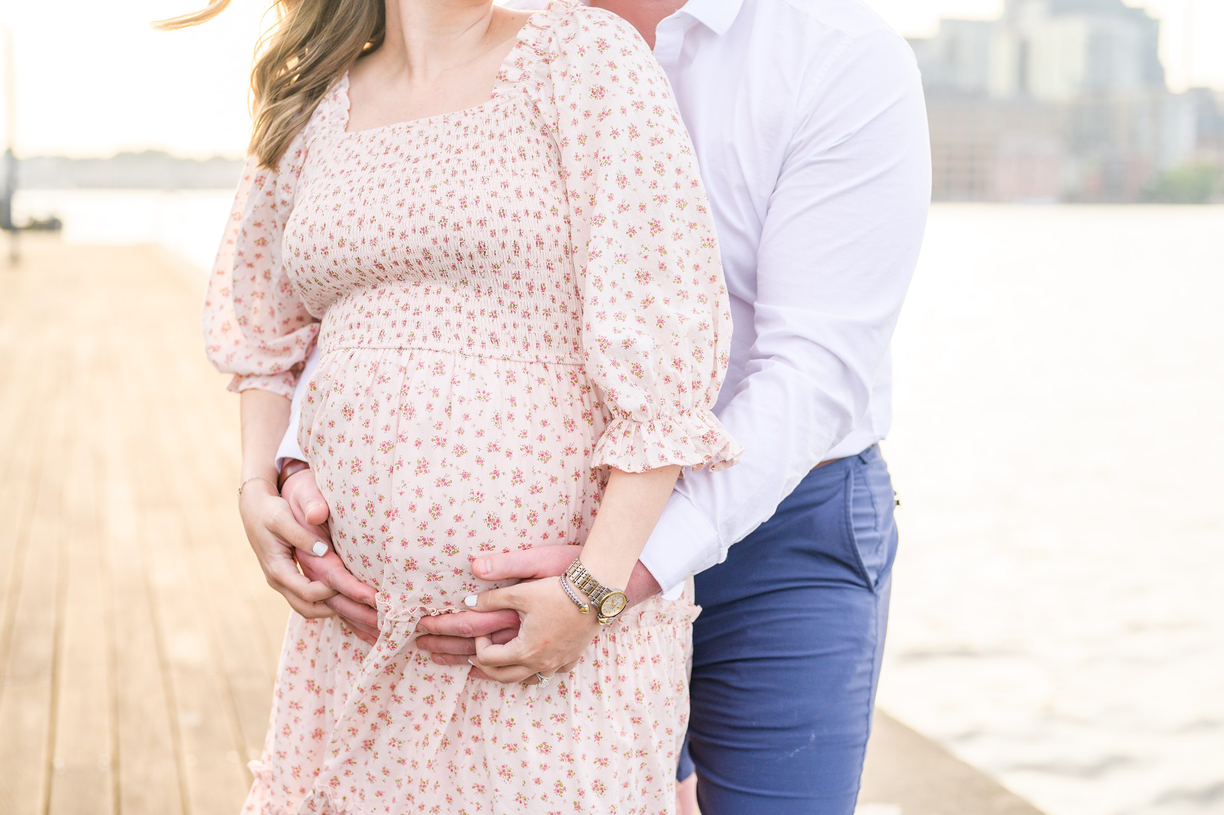 Mary and Adam's maternity photos in Locust Point in Baltimore featuring a stunning golden hour by Baltimore Photographer Cait Kramer Photography