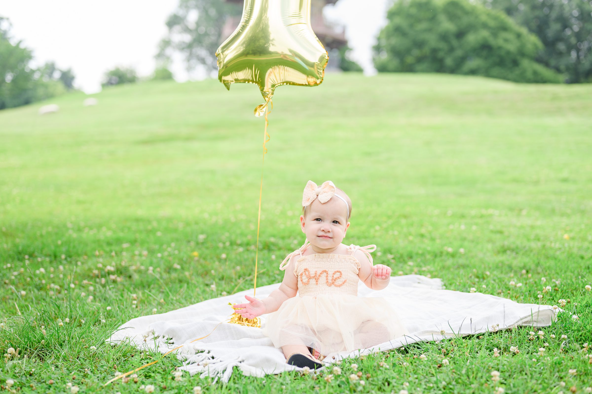 1st Birthday and Family Portrait Session at Patterson Park in Baltimore, Maryland. Photographed by Baltimore Family Milestone Photographer Cait Kramer.
