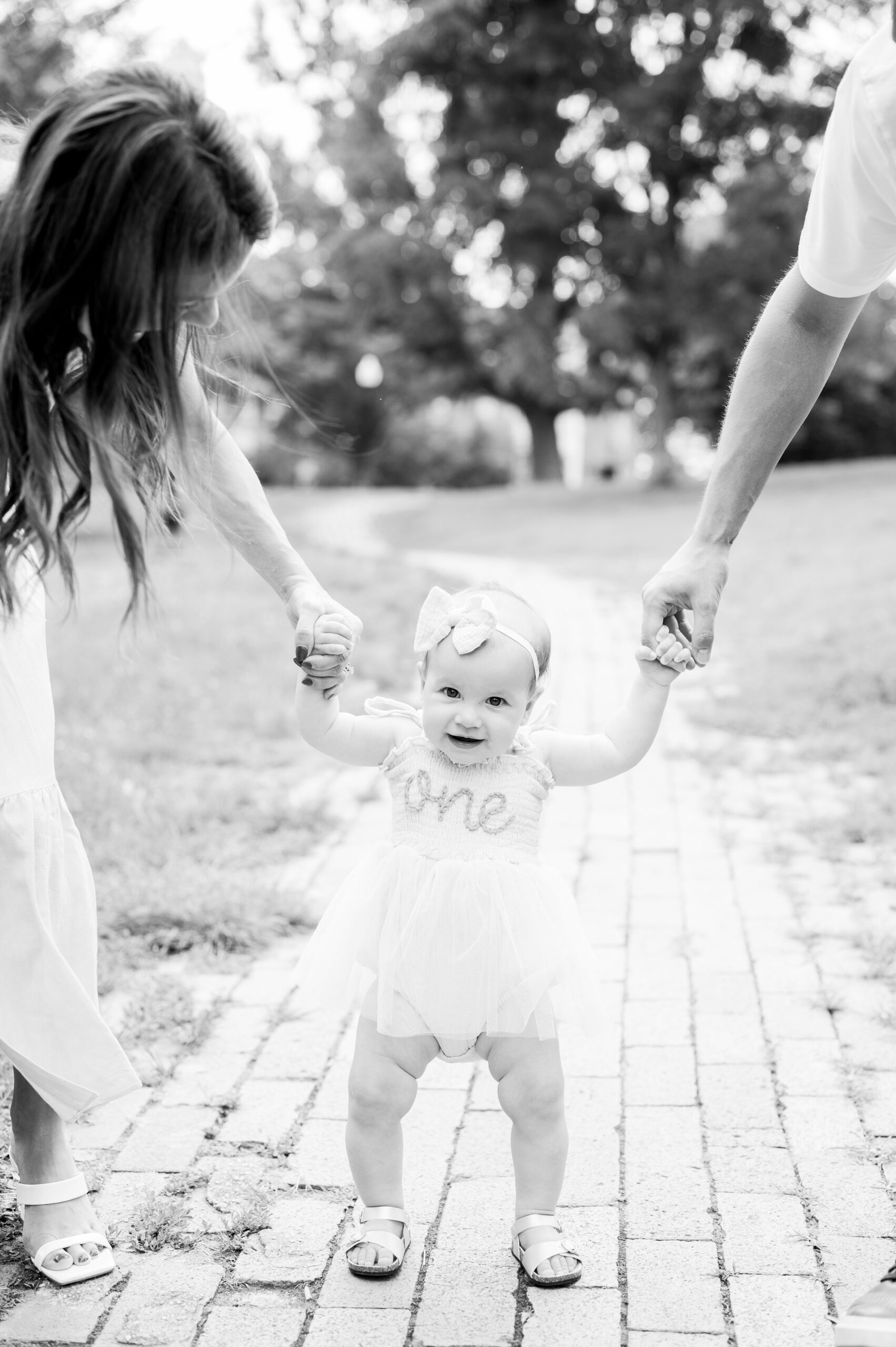 1st Birthday and Family Portrait Session at Patterson Park in Baltimore, Maryland. Photographed by Baltimore Family Milestone Photographer Cait Kramer.