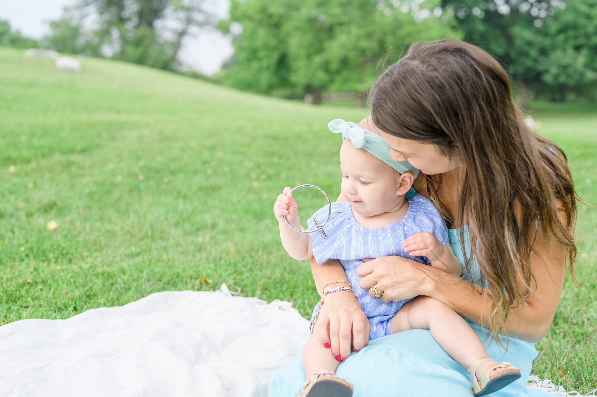 1st Birthday and Family Portrait Session at Patterson Park in Baltimore, Maryland. Photographed by Baltimore Family Milestone Photographer Cait Kramer.